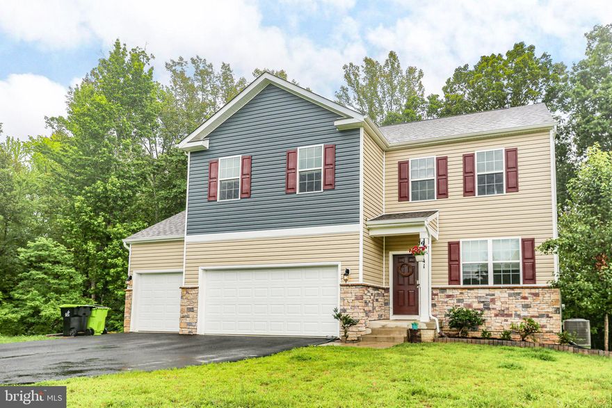 **Almost New 4BR Home on 3+ Private Acres – Rare 3-Car Garage!** **For sell or rent -- Seller is offering an Assumable VA Loan with interest rate lower than market rates -- inquire if you'd like to know if you qualify for the purchase!**

This beautifully maintained 3-year-young home offers over 3,300 square feet of space including ample storage and sits on over 3 private acres near a quiet cul-de-sac in Stafford County 22405—just minutes to downtown Fredericksburg, shopping, and VRE stations at Leeland and Brooke.  Easy commute to Quantico or to Dahlgren.

Step inside to an open layout with luxury vinyl plank (LVP) on the main level with a stylish kitchen with white cabinets, granite countertops, stainless steel appliances, walk-in pantry, and an island breakfast bar.   Large living room with lots of natural light and a huge deck with stairs to the backyard. And a flex room for an office or additional sitting room. 

Upstairs are 4 spacious carpeted bedrooms and a convenient laundry room.  The primary bedroom features a walk-in closet and deluxe primary bath featuring a walk-in large-tile shower, granite double vanity, and a private water closet plus a linen closet; ceramic tile floors.  Upper Level Main Bathroom is a full bath with tub and shower as well as a granite double vanity, linen closet and LVP.

Downstairs, enjoy a finished walk-out rec room with sliding glass doors to a stamped-concrete patio.  Perfect for entertaining or relaxing.  Unfinished space offers plenty of storage and rough-in plumbing for a 3rd full bath and space for another bedroom, gym, or office.

3-Car Garage  with epoxy floors  and parking for 6+ vehicles : bring your boat, RV, or motorcycles!  Surrounded by mature trees—a peaceful setting with a new deck and patio adding to outdoor living space. Internet and cable available.  HVAC regularly serviced and well maintained.  Gas heat (propane tank buried) and Culligan water treatment system.  

This home is ideal for anyone seeking **privacy, space, and modern comfort**—whether you're looking for a convenient commute; you're a car/bike enthusiast; or simply want a quiet place to call home.

10 minutes from the grocery store and other amenities plus just 10 miles to downtown Fredericksburg where all the boutiques and specialty restaurants are! A little bit of country but close to everything!

Schedule your showing TODAY!