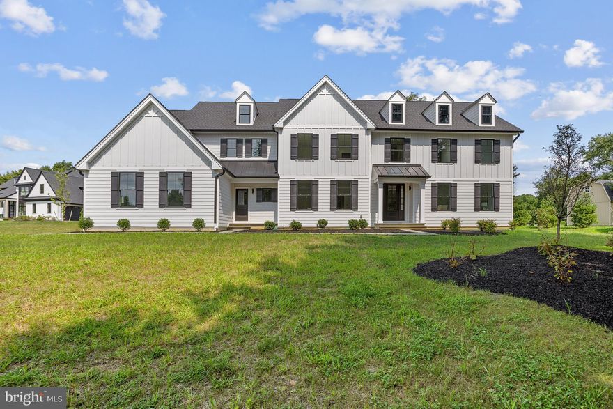 Luxury Redefined in this Absolutely Breathtaking New Construction build located in the heart of Edgmont Township. This 5 Bedroom 3.5 Bathroom Center Hall Colonial has been designed with every detail in mind. Pull into the private 2-acre lot to the oversized driveway, walk up the side walkway, and into the First Floor: The stunning foyer area provides an open sight line of the first floor. Site-finished Oak Hardwood flooring throughout, accented with custom millwork, neutral tones, and black and tan handrails, the foyer and hallway lead directly through the first floor. To the left, a formal dining room. To the right, the formal living room. Walk toward the black vinyl French doors to find a study located tucked in off of the powder room. To the left, walk through the hallway to the incredible living area. The wide-open plan provides the perfect space to entertain. The gourmet kitchen is simply flawless. The center island, complete with Carrara-style quartz countertop, is without question the ultimate gathering spot, situated directly between the morning room and the family room. The two-tone kitchen is complete with Simply White and Mineral Grey inset cabinets, a feature rarely seen in new builds. Built-in stainless steel Monogram appliances with brushed brass accents perfectly complement the modern hardware and fixtures throughout. The Kitchen includes a 36-inch gas professional 6-burner range, 30-Inch built-in single oven with air fry function, 36-inch professional hood with a quiet blower, 30-Inch built-in microwave, 36-inch French door refrigerator, 24-inch wine reserve, and 24-inch integrated dishwasher. The brushed brass pot filler faucet is placed along the Quartz backsplash to add yet another upgrade that sets this kitchen apart. A butler's pantry with a separate sink completes the kitchen. The morning room, which falls to the left of the kitchen, is full of natural light, offering French doors that lead out to the deck area. The Family Room falls directly centered off of the Kitchen Island. The vaulted ceilings, recessed lighting, ceiling fan, and shiplap accent wall with a built-in fireplace will have you sinking into comfort in this large yet cozy space. Off of the kitchen is the mudroom entrance which provides an additional first-floor powder room, separate exterior access, and access to the 3-car garage. Second Floor: The swanky master suite is remarkable. Vaulted ceilings, shiplap accent wall, ceiling fan, site finished hardwood, recessed lighting, enormous walk-in closet with custom cabinetry, and the owner's bath, which is purely sensational. Separate sinks with built-in drawers, a standalone soaking tub, curbless walk-in shower with flat black fixtures, rainfall shower head, additional wall mount and handheld shower, built-in bench, and glass enclosure. Walk down the hallway to Bedroom 2 with a private ensuite featuring black hex flooring, and white tile surround. Across the hall, Bedroom 3 and 4 share a Jack and Jill bathroom with stunning tile work, double vanity, and a shower stall boasting hex tile flooring and floor-to-ceiling tile surround. Further down the hallway, you will find the 2nd Floor Laundry room and off of that, the 5th bedroom which has access to Bathroom Number 2 and could also be used as a second home office space. Basement: The basement offers an additional potential 2200 Square Feet of living space, this space is simply waiting to be finished with walkout features and rough plumb for an additional bathroom. Additional Upgrades Include: Exterior Black Harvey Windows, Custom Trim on all Exterior Windows. 30 Year James Hardie siding, Board and Batten. Two Zone High-Efficiency Propane Heat and Central Air, 3 Car Garage, Ceiling Speakers throughout the home, Custom millwork, the list could go on forever.