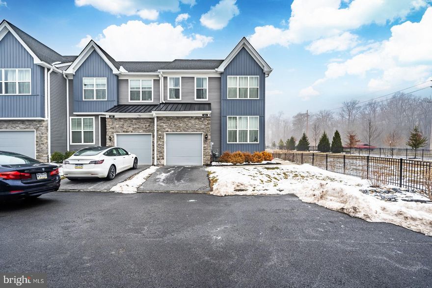 Welcome to this stunning end-unit townhome located in Toll Brothers’ Villages at Chester Springs community. This exceptional home showcases next-level design paired with high-quality finishes throughout and is located in the highly sought-after Downingtown East School District.

The first floor features an ideal open layout that blends functionality and convenience, including a bedroom and full bath. The kitchen, dining, and living areas flow seamlessly together, creating a bright and inviting space perfect for everyday living and entertaining. Highlights include high ceilings, hardwood floors, granite countertops, stainless steel appliances, a butler’s pantry, a spacious kitchen island, and recessed lighting.

Upstairs, the second level offers three generously sized bedrooms, including a spacious 20' x 14' primary suite with an en-suite bathroom and walk-in closet. A full hall bathroom and convenient second-floor laundry complete this level.

The fully finished lower level adds even more living space, featuring a mini bar area, office space, recessed lighting, updated flooring, beamed ceilings, and ample storage.

Enjoy a walkable lifestyle with nearby shops and dining, including Liberty Union, Starbucks, Stabler’s Beer Garden, Acme, CVS, and more. Ideally situated just off Route 100, the home also offers easy access to walking trails and parks.

This home perfectly combines convenience, style, and accessibility. Schedule your showing today—this opportunity won’t last!