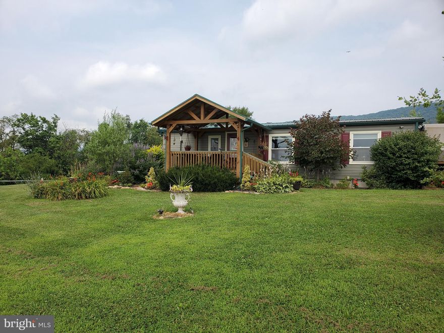 Absolutely beautiful ranch home situated on 7.62 acres in Upper Bern Township.  In addition, there's a  31' x 36'  five stall horse barn , complete with water and it's own  100 amp electric service, as well as feed and tack areas.  New fencing for the horses has also been installed around the property.  Breathtaking mountain views, abundant wildlife,  and plenty of privacy are only a few of the things this property has to offer.  Besides being only minutes from the Appalachian Trail and State Game Lands, the property lies directly in a major path for migratory birds, as well as having easy access to I-78 and  other major routes.  Since purchasing the home in 2018, the owners have lovingly renovated the whole house, as well as adding a 28'x 16' Great Room complete with a beautiful propane fireplace to the back of the home. Renovations include installing a new 33 handle kitchen with stainless steel appliances, new floors in kitchen, office, and bedrooms, new 200amp electric service,  a new 1500 gallon septic tank, new side deck, new lifetime metal roof as well as adding a new front porch roof.  Although this would be a perfect home for someone with horses, it would also be a perfect home for someone without horses.  The possibilities are endless. Schedule a showing and come see for yourself,  you won't be disappointed!!  (Also, please note that new tub/shower and vanity are being installed in the second bathroom!!)