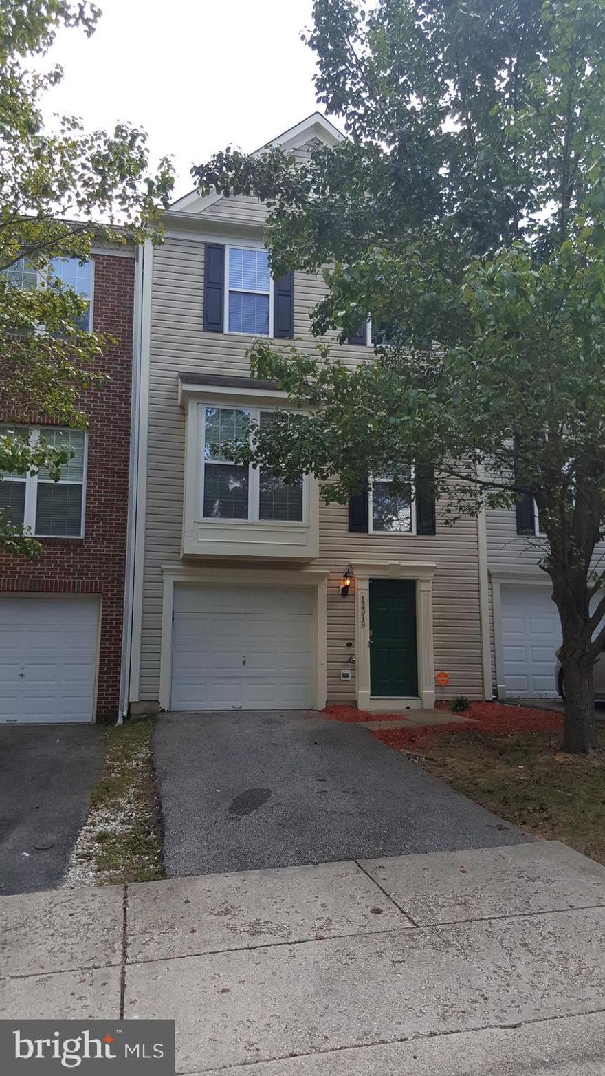 Gorgeous 3-level Townhouse in sought after establish community.   3 bedrooms, 2.5 baths, 1-car garage.  Beautiful Kitchen back splash and counters nicely updated.  Large center island - great for extra prep space, quick meals or family gathering time!  Hardwood floors in kitchen and breakfast eating area.  Lots of kitchen cabinetry and counter space.  Sliding glass door leads to outdoor entertaining deck.   Separate Dining Area off from spacious Living Room.  Lots of windows throughout for natural lighting!  Master bedroom with walk-in closet and attached master bath.  Master bathroom with soaking tub, double sinks and separate shower.   Additional 2 bedrooms upper level - great for office space,  guest room or create one bedroom into extra closet and storage space.  Basement/lower entry level is complete with an updated  half bath/powder room with tile flooring,  a large recreation room with a cozy burning gas fireplace and two large windows for natural lighting.  Lower level laundry area and storage room.  Minutes from Andrews AFB, other military sites, major beltways, shopping, schools, restaurants, MGM National Harbor and more!  Just move right in!