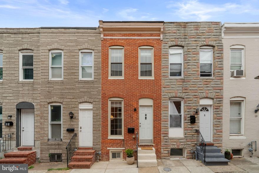 Beautifully updated 3-bedroom, 2-full-bath home less than 1 block from Patterson Park., featuring modern finishes and an incredible roof deck with sweeping city views. This charming Baltimore rowhome offers an open-concept main level with abundant natural light, hardwood floors, and a spacious kitchen perfect for entertaining. Upstairs, you’ll find 2 generously sized bedrooms and an updated bathroom designed for comfort and style.  The basement has an additional bedroom/den/office and another full bath. The expansive rooftop deck provides the perfect space for relaxing, hosting guests, or enjoying sunsets over the city skyline. Conveniently located near  Patterson Park, Canton Square, restaurants, shopping, and waterfront attractions, this home combines city living with modern comfort.
