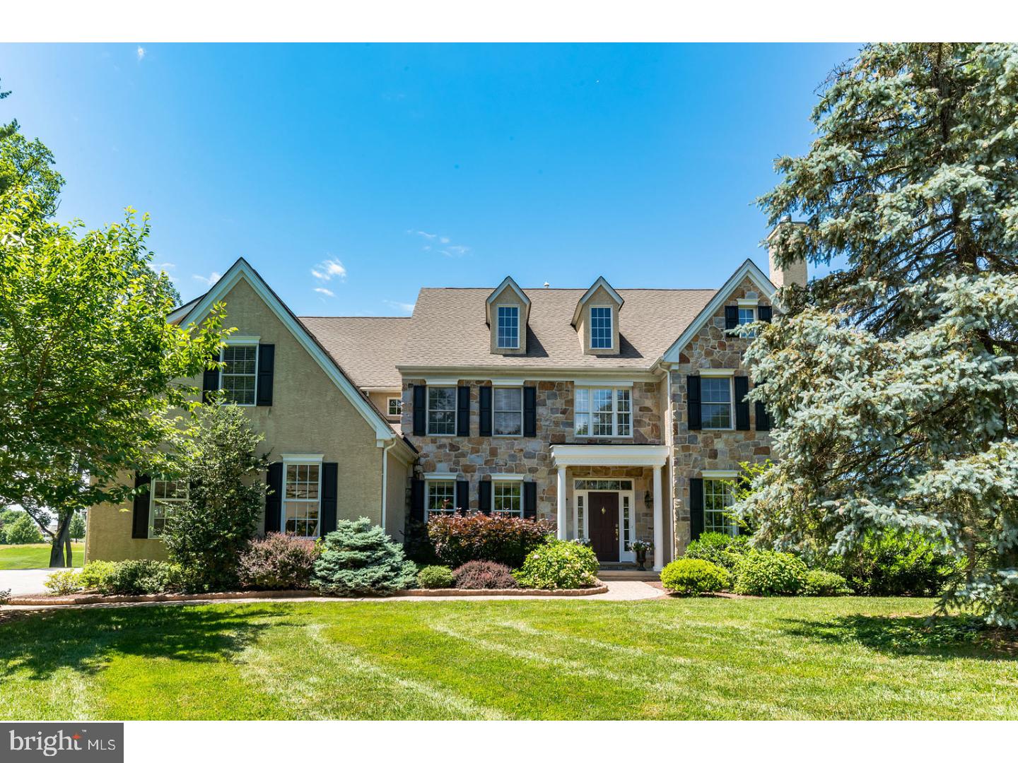 From the minute you enter the home, you will be delighted with the sunlight that pours through the many large windows; each one offering a spectacular view of the golf course. You'll immediately begin to appreciate the fine craftsmanship and attention to detail throughout this elegant home. Whether relaxing or entertaining, this home offers a balance of refined elegance and cozy comfortable spaces. Cul-de-sac setting on 1.17 acres, this magnificent home was artfully designed by architect, McIntyre Capron Associates. Enter through the front door and be welcomed into a gracious foyer with sweeping staircase, arched doorways, and onsite finished hardwood floors. The Living Room features a gas fireplace with decorative wood mantle and lengthened windows. The Dining Room boasts a tray ceiling, wainscoting, and hardwood flooring. The spacious Kitchen is outfitted with white custom cabinetry, stainless steel appliances, built-in refrigerator, center island with Black Absolute Granite and pull-out drawers making cooking for quiet family meals or lavish dinner parties a breeze! The vaulted ceiling accents the Breakfast Room. The wall of windows overlooking the 6th hole of the Overbrook Golf Club is the focal point of the sun-drenched Family Room. Office with cherry cabinetry and two powder rooms complete the main level. Spacious Master Bedroom with Sitting area and his and her walk-in closets. The Master Bathroom features a walk-in shower, soaking tub and two vanities. Four additional Bedrooms, Hall Bathroom, Jack & Jill Bathroom, Laundry and Desk area nook perfect for homework complete this level. The finished walk-out lower level is approximately 1,900 square feet with windows overlooking the golf course and two doors to the outside. It is a perfect space for entertaining with the Built-in Bar complete with dishwasher, ice maker and wine fridge, sitting area to view all your favorite sports, office, powder room and plenty of storage. Enjoy the sunsets overlooking the golf course in this spectacular home situated in the Radnor School District, located just minutes from the popular Main Line towns of Wayne, Bryn Mawr, and Newtown Square, and close to all major roadways for commuting to Center City and the airport. This residence is sure to impress even the most discerning homebuyers!