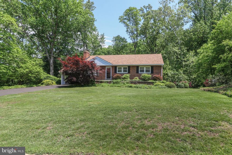 Charming single family w/private wooded view * Recent updates include brand new carpet on lower level, hot water heater (2016), furnace (2015), roof (2014), Kitchen/Hall Bath/Screened Porch (2009) * Hardwood floors * Lower level w/full bath, BedRm/Den w/cedar closet, huge FamRm w/fpl * Deck, screened in gazebo & patio are perfect for entertaining guests and provide abundant privacy * A MUST SEE! *