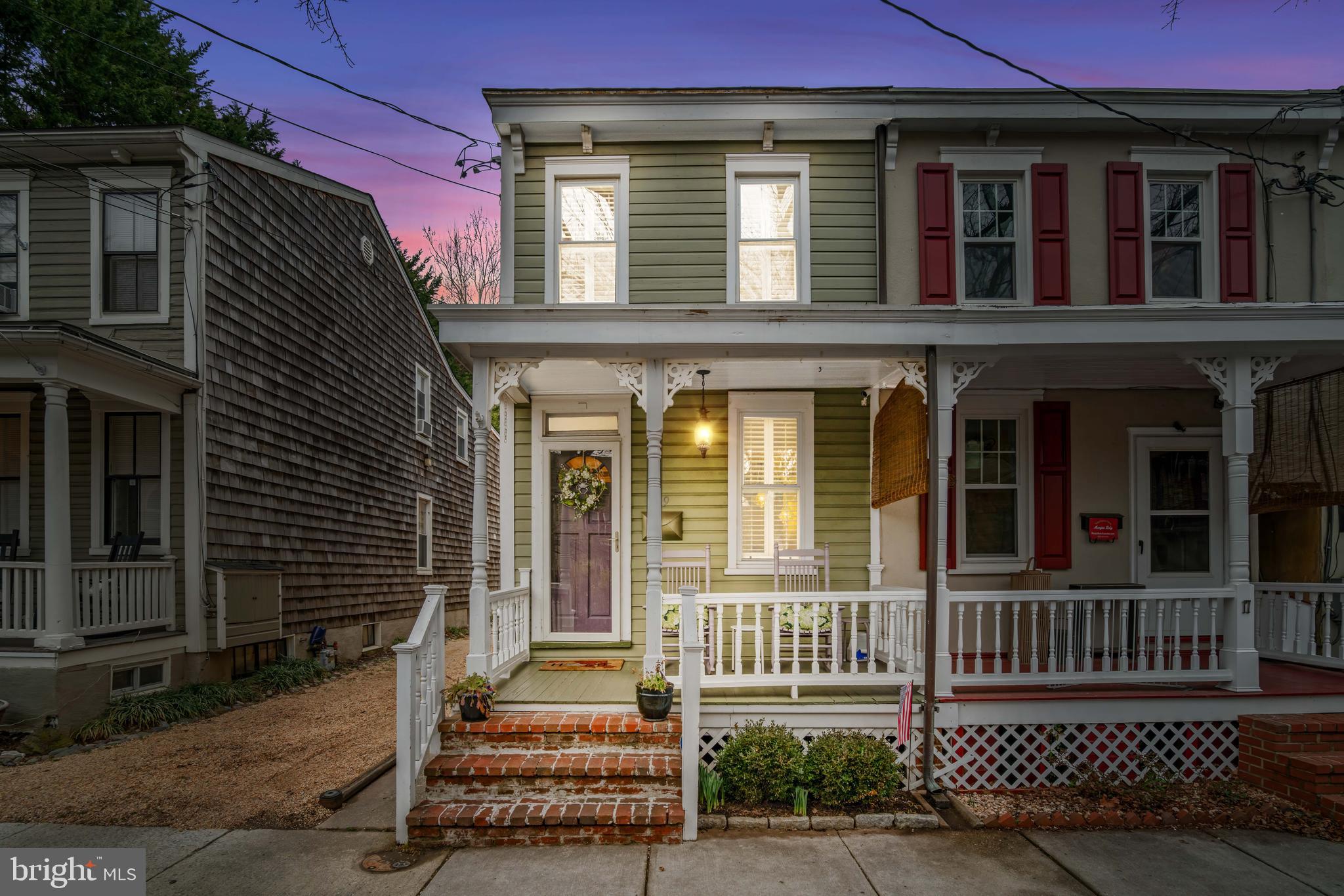 Discover the allure of historic Annapolis living in this captivating 2-bedroom, 1.5-bath home located in the desirable Murray Hill community. This home offers a seamless fusion of historic charm and modern upgrades. The heart of the home is the renovated kitchen, complete with custom cabinetry, granite countertops, and a gorgeous backsplash. The washer and dryer are conveniently located in the main living area. Beautiful hardwood floors can be found throughout the home. Enjoy the expansive backyard patio, set against a backdrop of exquisite landscaping. The backyard flower garden boasts a variety of blooms including hydrangeas, peonies, phlox, tulips, hyacinths, lilacs, lilies, daisies, daylilies, coneflowers, and roses - not a single spot overlooked, resembling something from a magazine. The garden is stunning, throughout the year. Being an end unit, there are numerous advantages - easy access to the home and seamless transition between the backyard and indoors. Additional highlights include a spacious basement for abundant storage and a very spacious shed. Enjoy serene evenings on the inviting, cozy front porch or take a stroll to Main Street and West Street within a short distance. This charming home is situated in the heart of Annapolis, offering easy access to the city’s vibrant restaurants and art galleries. Enjoy the convenience of being close to major commuting routes such as I-97, US-50, and MD-32. Nestled in the highly sought-after Murray Hill, this residence provides a perfect location just steps away from Downtown Annapolis. Discover exquisite dining options, the prestigious Naval Academy, scenic views of the Chesapeake Bay, and diverse shopping experiences. The neighborhood boasts wide streets lined with majestic trees and provides access to Spa Creek for a tranquil waterfront setting. You are bound to fall in love with this exceptional home!