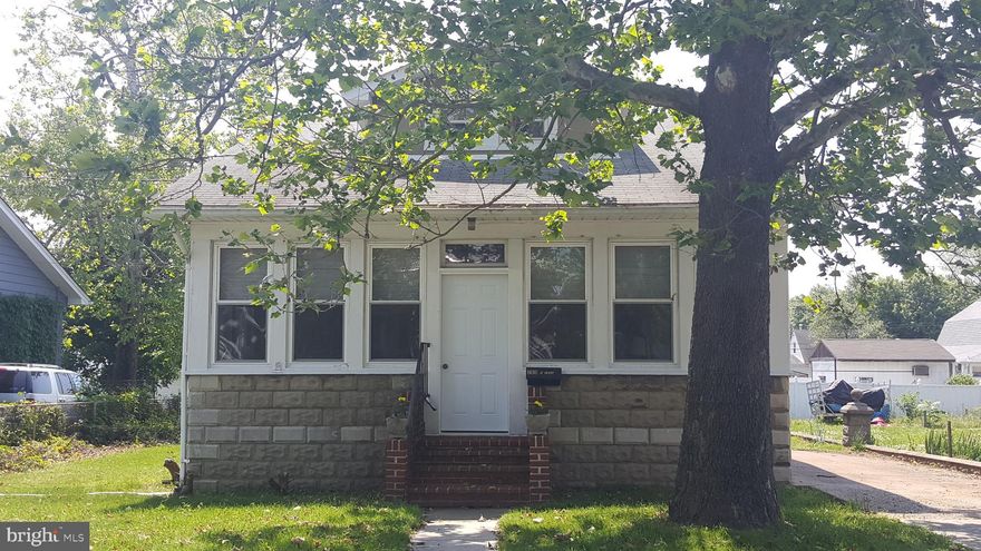 Home is only 1 house away from bayfront access - Community beach, ramp and pier...small yearly fee to use ramp.  Dated but seems very structurally sound. Has oil heat and CAC.   1st Floor has enclosed front porch entrance and also back screened porch off the kitchen perfect for outdoor bug free dining.  1st Floor features eat-in kitchen, Dining Rm, 2 Bedrooms, Living rm. and Bath.  Second Floor Features a huge open Room which could be a Great Master Bedroom or Children's room/play area  or an additional 2 Brs and another bath--Full unfinished Basement o lots of storage- Large Backyard totally cleared and grassed ready for the gardening enthusiast. Community features beaches on the bayfront and also on Stoney Creek with a pier and also boat ramp.  Multiple playground areas and sports opportunities for kids.  Convenienly located to schools, shopping, churches and all major routes.