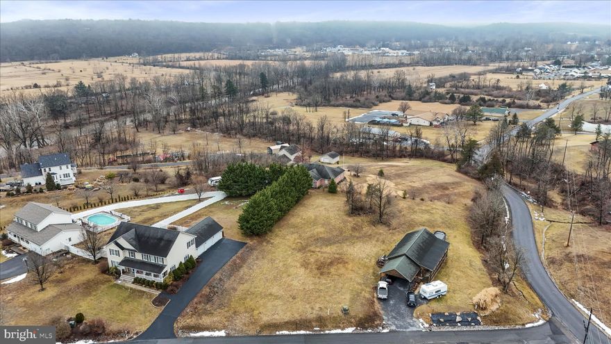 Build your dream home on this beautiful half‑acre lot in one of Capon Bridge’s most desirable neighborhoods. - Waterview Estates. Enjoy private river access, a flat and build‑ready homesite, and the convenience of public water, sewer, and electric already available. A rare opportunity to create the perfect getaway or full‑time residence in a peaceful, well‑kept community.