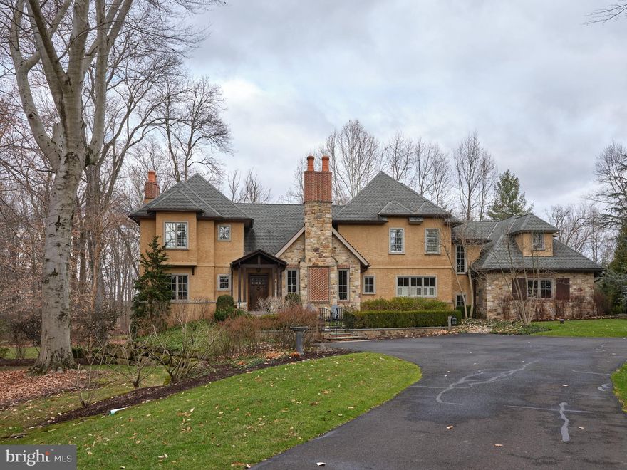 This grand residence meets all of the requirements for a prestigious yet comfortable lifestyle. It is a testament to unique charm and striking architecture. Particularly worthy of mention is the beautiful setting, simply idyllic, offering the utmost privacy with ideal places to relax and recuperate. Elegant throughout, you will find the property in excellent condition with spacious, yet charming living areas, 4 en suite bedrooms and a 5th bedroom in the lower level. The abundance of windows and French doors allows for the perfect amount of natural sunlight. Just some of the exquisite details include 3 wood burning fireplace (one of which can easily be converted to gas), vaulted wood trimmed ceilings and beautifully crafted built ins. The impressive kitchen boasts a separate butler’s pantry, a large wine fridge and top of the line appliances. Gorgeous wood floors are throughout the 1st floor, along with a handsome library, formal dining room with a dramatic vaulted ceiling and beautiful gathering room open from the kitchen with step out access to the lovely terrace, just perfect for entertaining. The list of special features goes on. It’s our pleasure to tour you through this perfectly lovely home.