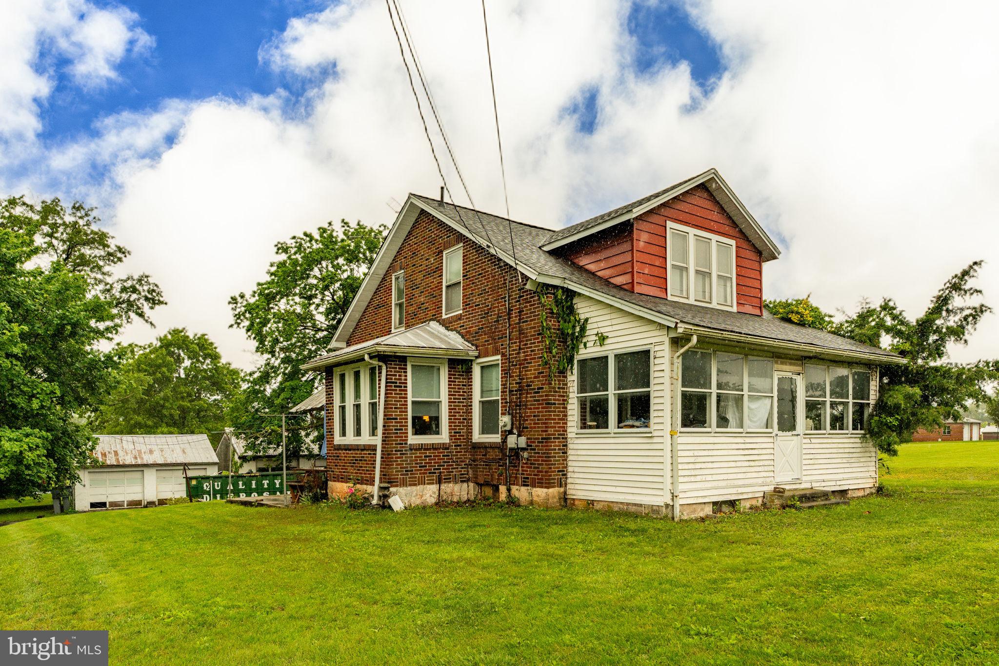 AUCTION DATE - THURSDAY, JULY 10, 2025 at 5 P.M. LISTED PRICE IS AN OPENING BID ONLY AND IS NOT INDICATIVE OF THE FINAL SALE PRICE. REAL ESTATE: Custom 1½ story brick/vinyl house w/1509 SF finished area, eat-in kitchen w/fridge, living room, bonus/sitting room, 3 bedrooms, 1½ baths, 1st floor laundry, screened-in side porch, attic, basement w/1-car garage, oil baseboard heat. Outbuildings: Detached masonry 3-car garage/shop 48x24 w/electric, detached masonry 2-car garage w/electric & wood chicken house all on level 1½ ACRE rural country lot w/mature shade, large side lawn area, on-site well & septic. Zoned Ag. NOTE: Owners are downsizing to retirement quarters & motivated to sell. Ideally located brick house & 6-car garage capacity, all in need of TLC. Lots of potential. Ideal as a residence or investment. Convenient location, minutes to Reinholds, Schoeneck & Denver. Terms 10% down, balance 60 days or before.
