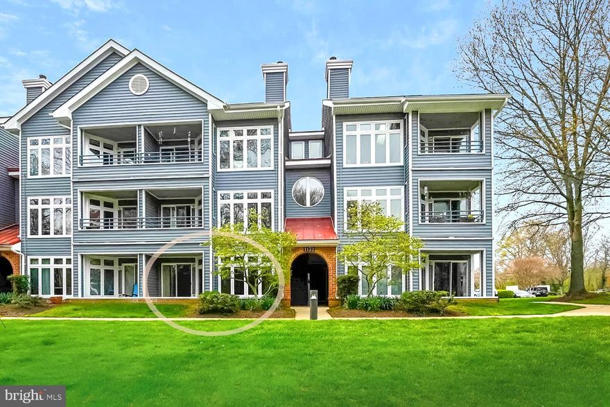 UNIQUE SINGLE LEVEL CONDO WITH BOTH PATIO & TERRACE!  COVETED LAKE HERON COMMUNITY WITH POOL!  Ground level Condo showcasing sophisticated Bay living with open Great Room combining living, dining & cooking areas spilling out to covered patio.  Shared fireplace ambiance and terrace-like wall of windows bringing nature indoors ... Peaceful verdant view of community commons!  Shared Kitchen dining/beverage bar for entertaining!  Sleek granite/stainless Kitchen.  Generous Primary Bedroom Suite with 3 closets, ensuite dual vanity Bath, and sliders to tree-shaded terrace for morning coffee!  2nd Bright Bedroom; hall Full Bath.  Stacked laundry closet.  Convenient lot parking.  Minutes to downtown City Dock, USNA, premier Westfield & Towne Centre Malls, Bay beaches, and commuter RTs 50/2/97.  TASTEFUL!  TEMPTING!  TOTALLY TURNKEY! (Special assessment fee:  $94.46/mo. (Feb-Oct 2022) $850 divided by 9 months for resurfacing & repair of parking lot).