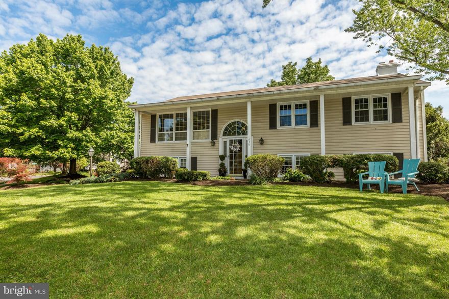 Beautiful home in the heart of the Village Green Community! This home features 4 spacious bedrooms, 3 full baths, built ins throughout w/tons of storage, newer HVAC system, granite counters, beautiful wood floors, living room w/lg. windows and tons of natural light! Home complete w/ play/swing set and beautiful landscaping all around!