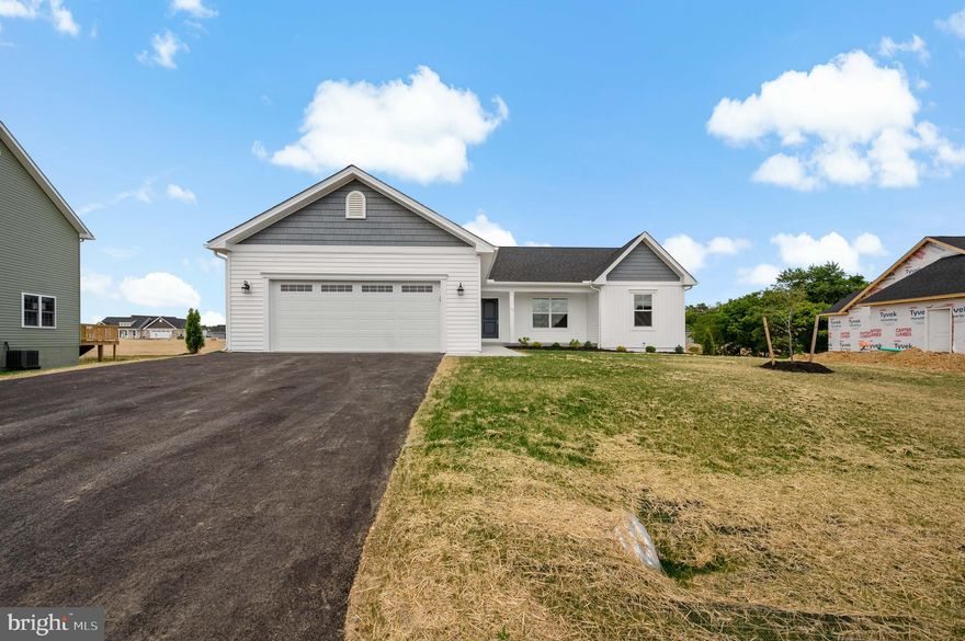 *Photos are of a different build, same floorplan - different color scheme.  Construction will be complete in September. New construction rancher, ready for a September move in.  This home comes with several upgrades including an attached 8'x10' storage shed, fireplace, ceramic tile shower, custom cut shower door, quartz countertops, ceramic tile backsplash and soft close cabinets!  Part of the lot is lined with trees.  2x6 framing 16" on center and R-21 for all exterior walls. R-49 Blown in insulation in the attic. LVP flooring in all main living areas, comfort height commodes, soft close cabinets, sanitary trim, walk in shower, 30 year architectural roof shingles and maintenance free siding are all included! Home comes with GE Kitchen appliances from Spichers, a Trane HVAC system and a 1 year builders warranty.