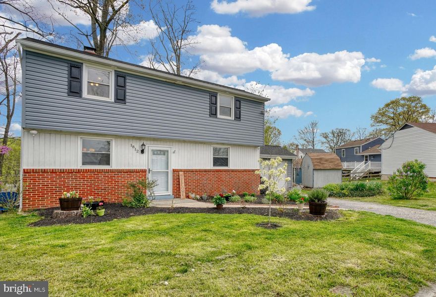 OFFER DEADLINE: MONDAY MAY 2ND at 12PM. Welcome home to this fantastic uniquely designed home in the wonderful Cromwood community. Step into the first level with newly renovated open design kitchen/dining which also leads to the one car garage. Go up to the main level and check out the gorgeous hardwoods throughout. Enjoy winter nights in front of the fireplace and use the room on this level as a bedroom or office. Head to the upper level with primary bedroom and second bedroom, again with marvelous original hardwoods, and updated bathroom. Lower level features a potential 4th bedroom - or office, workshop, craft room, you name it! So much natural light throughout the home. Then... step out back for your oasis from the hustle and bustle of modern life. Large all season room for hosting any event you can throw at it... crab shack, anyone? Large fire pit area as well to roast marshmallows or get out that guitar you've been meaning to practice! Take the walkway to the lower section of yard with storage and so much room to throw/kick the ball around. Woods, privacy, tranquility and a great living space. Not to mention... Tons of updates! Roof (2020), HVAC (2021), Water Heater (2018), Vinyl Siding (2022).  You can have it all right in the middle of everything!