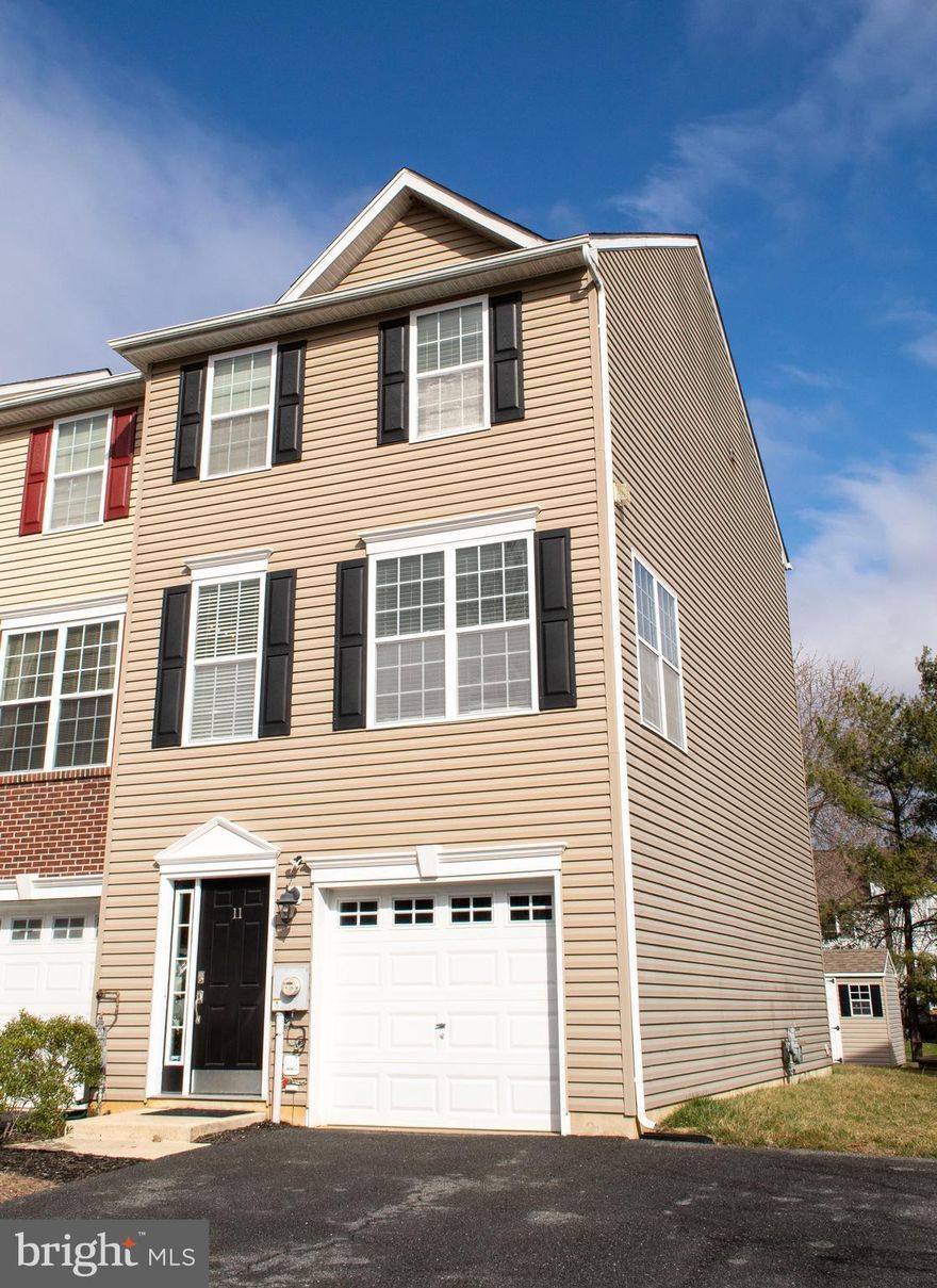 Welcome to Persimmon Creek! This beautiful end unit townhome offers 3 bedrooms, 2 1/2 baths and a one car garage. Entry level has access to the 1 car garage, finished bonus room, and gives access to your backyard, where you'll be able to relax by the firepit. The Main level features a large eat in kitchen, sliding glass door to the deck and a spacious family room filled with tons of natural lighting. Upstairs you'll find the owners suite that includes it's own private bathroom, 2 additional bedrooms and full bath. Storage will not be a problem with the custom-built storage shelves in the attic. New paint and carpet throughout! Great location just outside of Newark and close to 95.  Come check it out today!