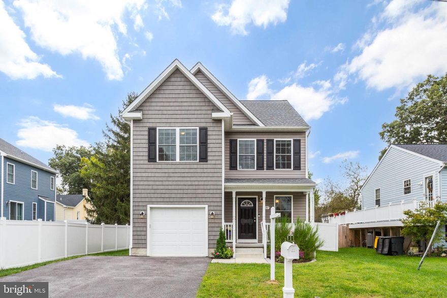 Welcome to 697 Duvall Hwy. Climb up the front stairs, cross the front porch and enter this like-new colonial built in 2020. Enjoy hard floors on the first level with an open floor-plan connecting the living room and kitchen. Bright white shining quartz counters, Soft closing cabinets and stainless steel appliances give the kitchen a modern sleek feel. From the living room look out on lush green lawn of the spacious backyard. Sliding glass patio doors fill the space with light. Step through them onto a custom-made patio perfect for relaxing, having a cook-out, or enjoying fresh air. The backyard is enclosed by a strong tall white fence making it safe for you and your pets to enjoy the lawn. Going upstairs you find 4 bedrooms, with the prime having cathedral ceilings and an attached full bathroom. An additional full bathroom serves the other bedrooms. In the finished basement you find a large area for recreation or for watching movies. There is a second room that can be used as a home office or work area. A basement door opens to stairs going up to the backyard. Modern sprinkler system throughout the house. 1 car garage with access to first level. Close to major roads. Anne Arundel school system.
