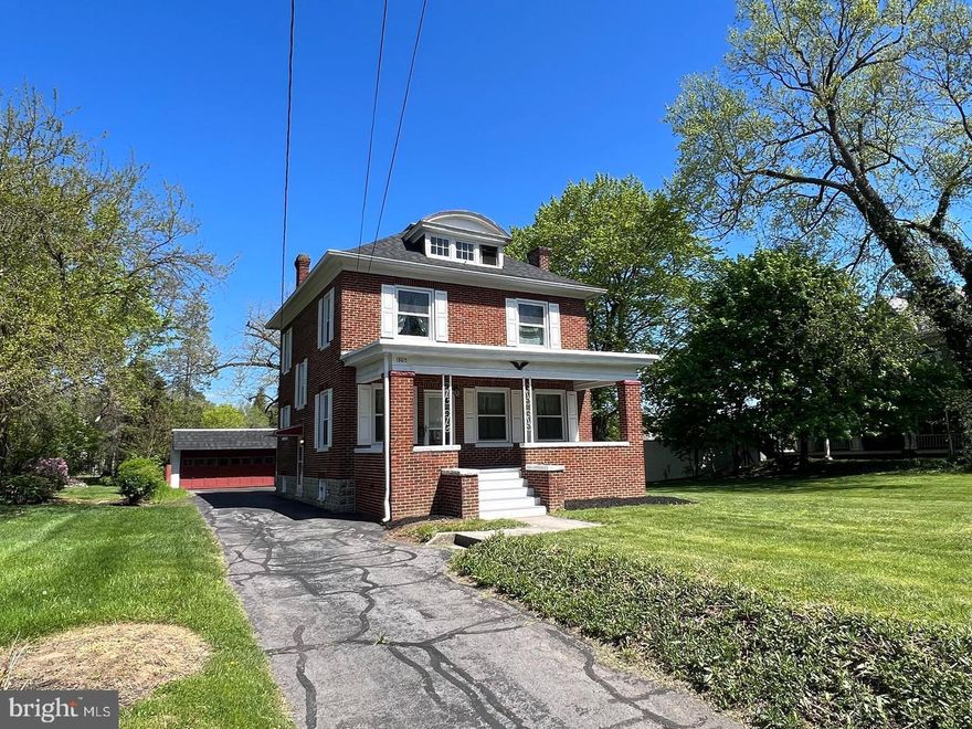 Lovely older all brick home that has been cared for with love. Newer roof, replacement windows, large wonderful front porch and steps that have been restored; beautiful hardwood floors and natural woodwork; large foyer and formal dining room and living room with fireplace and loads of character and charm;  oil heat and central air, full basement that was partially improved; oversized double lot with access off Virginia Ave with driveway crossing through lot  to street in rear; detached single car garage with new roof; mud room and 1/2 bath in rear off kitchen, 4 bedrooms and full bath on second level; large walk-up attic gives load of extra storage.  Convenient to everything! You will certainly fall in love ! Selling "as is" to settle estate.