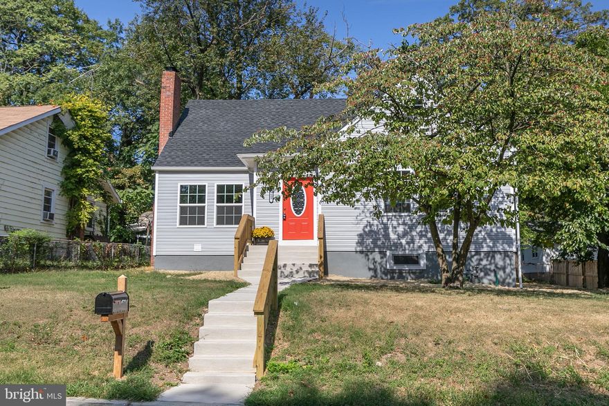 Back on Market. Buyer Financing fell thru. Beautiful home situated atop a large lot with privacy fence in rear.  Enter the foyer and you are greeted by a large living room area, dining area and gourmet kitchen with stainless steel high-end appliances and granite counter tops.  Two bedrooms conveniently located on the main level; large bedroom with walk-in closet on upper level.  Fully finished lower level  with huge recreation/family room area and additional bonus room  for office, den or playroom, etc.  Large rear yard and driveway for multiple cars.  You won't be disappointed!  Schedule your showing today!