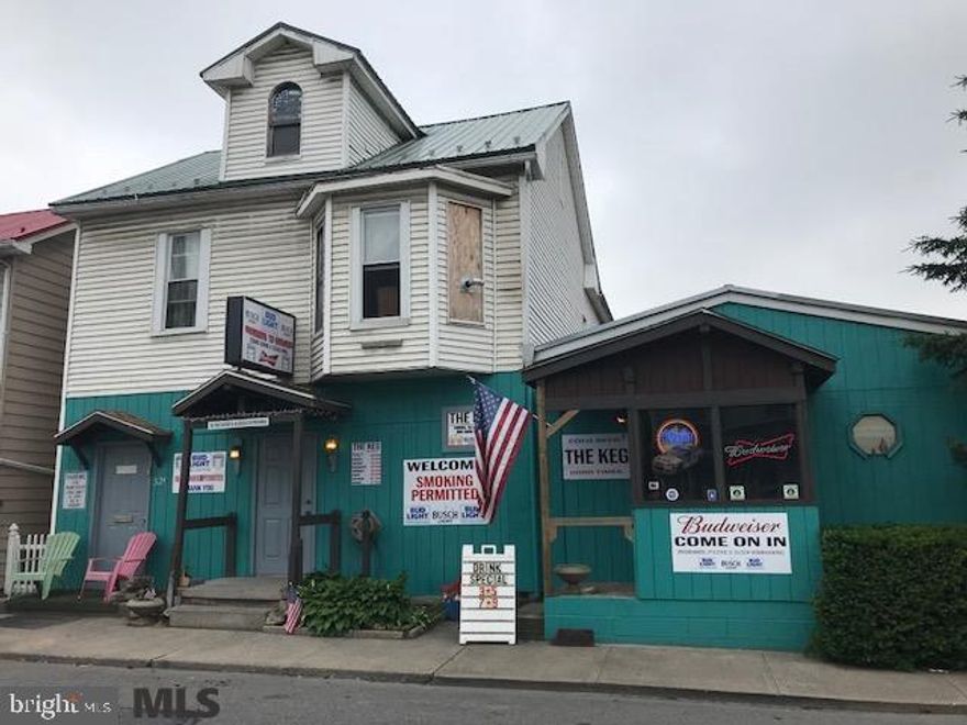 Established Bar Business including liquor license, upper level 4 bedroom apartment, large 40 X 80 space, includes kitchen equipment and inventory, . Security camera system. ATM, rip ticket machines and pool table income weekly. Parking in rear, and on S. Main Street.,Bar Business and Upper Level 4 BR Apartment; Security Camera System; ATM