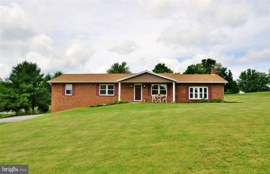 Gorgeous brick rancher with amazing views, steps from the Maryland line. Perfect kitchen with granite counters, SS appliances, and an abundance of storage cabinets. Home has beautiful wood floors, two fireplaces, sunken living room and family room, three and a half bathrooms, fully finished lower level, and a perfect patio to enjoy the lovely yard. Just move in and enjoy. Check out the pictures and call to make your appointment today.