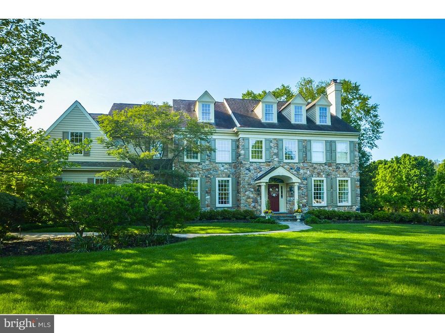 Enjoy living in one of the most prestigious neighborhoods in Lower Gwynedd. This beautifully appointed stone front custom Guidi built home is an enduring traditional classic. Set the stage for a grand entrance in this spaciously appointed foyer with beautiful staircase that leads to sophisticated living areas. A lot of livability in over 7,000 sq. ft. 5 Bedrooms, 4 full and 3 1/2 Baths. Spacious Dining Room, Formal Living Room with Fireplace. The large Great Room with raised hearth stone fireplace will be the center of entertaining in style.  Experience the joy of cooking in this fully equipped kitchen featuring cathedral ceiling with skylights, granite counter-tops double ovens, gas range, microwave, large center island and loads of pantry space. Breakfast room off the the kitchen provides views of the sun drenched sunroom that leads to a backyard flagstone patio. Main Bedroom suite is enhanced by en-suite with soaking tub, double vanities, and room sized walk-in closets.  Finished 3rd floor level with full bath doubles as a 5th bedroom or fantastic play-room.  Lower level, Entertainment and media room in the dramatic, family sized recreation room with full sized wet bar & stacked stone fireplace.  Work out in your private exercise room. Other amenities include: custom millwork and bead board t/o, central vacuum, stereo surround sound, hardwood floors, upgraded carpets, new garage doors. Situated on approximately 1 acre of meticulously groomed yard and patio this Enduring Classic is a statement of the Pride of Ownership.