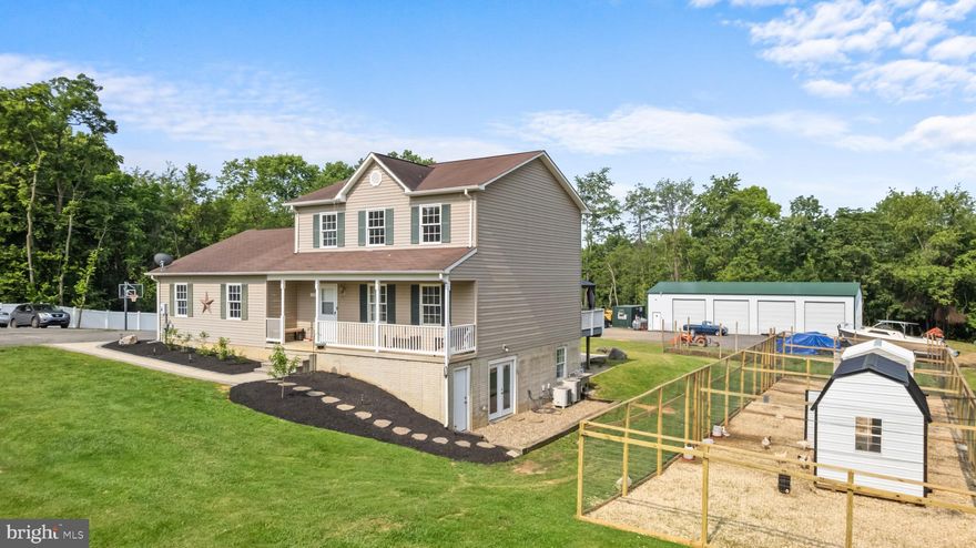 NEW PRICE $622,222 |  Nestled in the tranquil setting of Shepherdstown, this beautiful Colonial home offers a serene retreat with tons of amenities! Boasting 6 bedrooms and 4.5 bathrooms, it sits on nearly 4 acres of picturesque land. The partially fenced property includes a charming chicken coop, as well as other livestock included areas, perfect for fulfilling your farm dreams. Enjoy leisurely days on the back deck or the stunning stone patio. An extra-large detached garage ensures ample storage space. This home promises blissful nights and fun-filled days in a peaceful environment. Main level features a large entertaining kitchen with granite countertop and dining space, Sunk in Great Room with 9+ ft ceilings, Office/ Den Room, Full Bathroom with double sinks and walk in shower, main level bedroom and half bath. Upper Level offers a Bedroom with attached Full bathroom and walk in closet, as well as 2 guest rooms and full bathroom and hall closet. Walk out level basement offers 2 bedrooms, full bath and ample storage. Backside of the property houses the large 4 bay garage with electric + extra tall doors to fit all your business, hobby or personal needs.  Located on a quiet road paved road  close to the C&O Canal, Appalachian Trail, the Potomac and Shenandoah River for all of your outdoor recreation. Plus  minutes to the quaint town of Shepherdstown and Shepherd University. As well as to Rt 9 , 340, 115, Virginia and Maryland state lines. LOW TAXES! THIS IS A MUST SEE PROPERTY!