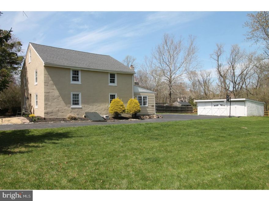 You won't want to miss the character, charm and pride of ownership in this historic, stone converted school house! Exposed beams through out the entire first floor, deep window sills, beautiful hardwood floors, wood burning fireplace are all wonderful features in this traditional home. The living room, dining room, family room and updated kitchen have the perfect flow for entertaining! The original school house steps take you to the second floor with a large master bedroom with a second room attached, perfect for a nursery, office, or sitting room. The second/third bedroom also has a great closet and deep window sills, and could easily have access to the large hall bathroom, making it a perfect master bedroom also.  Also, on the second floor is a separate laundry room, and access to the attic perfect for another room! Enjoy quiet evenings on the cozy porch overlooking the beautiful landscape.  Mature trees and expansive flat, fenced in yard and 3 car garage. Absolutely everything has been done for you, with a new roof in 2013, new public sewer system, updated electrical and windows. Meticulously maintained, this is a truly special home.  It is so well built and so quiet and peaceful inside! Don't miss this opportunity to a own charming, one of a kind home, in Award Winning Colonial School District, close to all major transportation, Pennsylvania Turnpike, Route 476, Septa trains, restaurants and shopping.