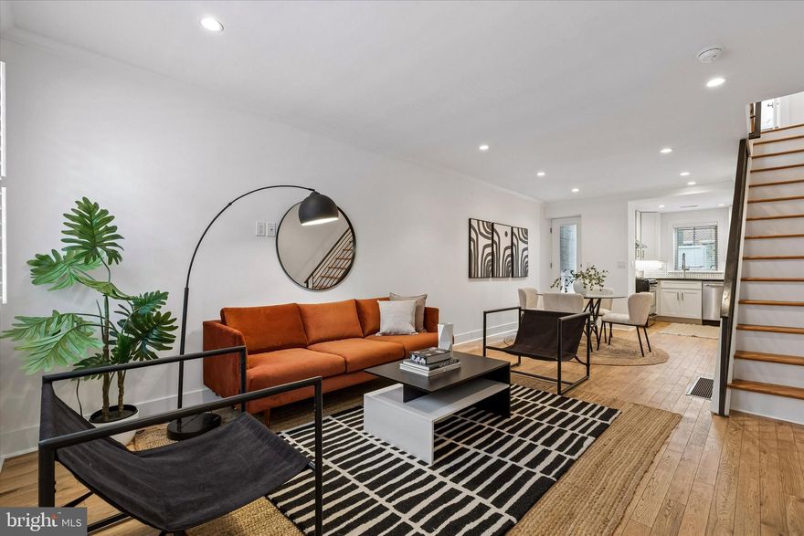 Welcome to 313 Mercy Street — a classic South Philadelphia rowhome tucked into the heart of Pennsport. This home blends timeless character with thoughtful updates, offering a layout that feels both comfortable and functional. Step inside to an open living, dining space and kitchen with natural light and room for both everyday living and entertaining. The kitchen provides direct access to a private rear patio — perfect for morning coffee, container gardening, or summer grilling. Upstairs, you’ll find 2 nicely sized bedrooms each with custom designed closets to maximize space, a full hall bath, and laundry. Whether you need space for guests, a home office, or a nursery, the flexibility is there. The full basement provides additional storage. Located just blocks from neighborhood favorites, parks, public transportation, Moonshine, Mifflin Tavern, Rebel & Wolf Cafe, South Bowl, Target, iconic 2nd St/Mummers Row, and convenient to East Passyunk, the Stadium District, and major highways, this is a smart opportunity to own in one of South Philadelphia’s most established communities. If you’ve been waiting for a solid home in a great location with room to make it your own, 313 Mercy Street is ready for its next chapter.