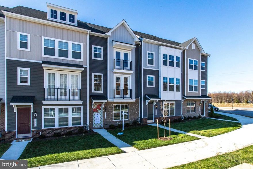 Experience luxury living at its finest in this townhouse featuring 4-bedroom and 3 full and 1 half bathrooms. Almost new townhome, complete with a 2-car garage, offers the perfect blend of style and functionality. Revel in the gourmet kitchen, equipped with granite countertop, stainless steel appliances and luxury vinyl plank flooring. This home features a bedroom and a full bathroom on the entry level, providing versatile living spaces. Enjoy the ultimate convenience with every essentials just a stroll away in this maintenance-free, urban oasis. Located just 1 mile from Rt 15 and surrounded by shops, restaurants, grocery stores, and entertainment options, the Towns at Market Commons redefine urban living. Discover this ideal retreat, only minutes from the historic charm of Downtown Frederick.!