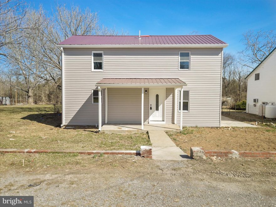 This newly updated home features a durable metal roof, brand-new windows, a new HVAC system and stylish modern finishes throughout. The spacious master suite is conveniently located on the main level, while upstairs offers two additional bedrooms and a full bath. Enjoy cooking in the brand-new kitchen, complete with quartz countertops and new appliances that offers an eat-in space next to the spacious living room.  The home also boasts new LVP flooring, updated light fixtures, and fresh finishes throughout. Situated on a nice lot in a great location, this move-in-ready home is a must-see!  It is believed to have high speed internet.