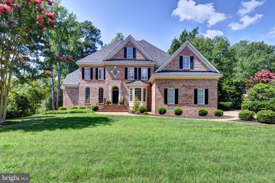 Stunning, brick, traditional home in The Governors Land at Two Rivers. Nestled on the ladies 14th tee of the top-rated Tom Fazio designed golf course with serene golf views throughout the home. Phenomenal floorplan with a keeping room off the main entrance that could be a second bedroom on the main level and shares a full bath with the hall. The massive primary suite features office space with golf views, amazing closet space and an en-suite with with dual vanities, soaking tub and shower. The two story living room is breathtaking and full of natural light leading to the kitchen with its own eat-in and lounge area all connecting to the lovely back deck. A sizable laundry room and two car garage with extra storage complete the first level. Upstairs a massive bonus room leads to the hall with three additional well sized bedrooms and two full baths. Fantastic storage in the attic and a brand new roof! See this one first!