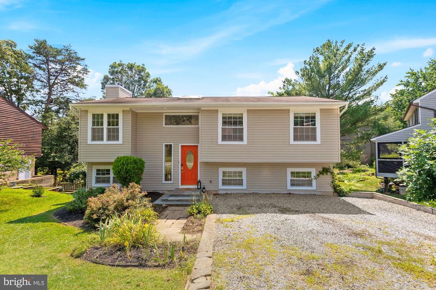 Gorgeous split foyer in the heart of the Broadneck Peninsula a stone's throw away from Broadneck High School.  The master on the lower floor is wonderfully done with a spa like retreat -  oversized shower, large jacuzzi tub and walk in closet await the lucky new owners.  The kitchen upstairs was completely opened for wonderful entertaining and dining area all accented by a large skylight providing awesome natural light.  The upstairs bath is a beautiful companion to the master and features double sinks, separate tub and oversized stand up shower.  The outside entertaining area is second to none at this price point - oversized deck, huge outdoor patio, fully fenced AND overlooking serene and private open space!!  Priced aggressively for a quick sale - don't hesitate on this one!!