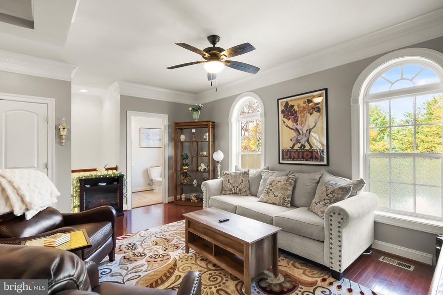 Welcome to this pristine brick-front end-unit townhouse in the highly sought-after South Market / Villages of Piedmont community in Haymarket. Boasting three levels of living space with over 2,000 square feet of living space; this immaculate home is a 10 out of 10!
Step into an inviting main level with hardwood floors, open-concept living/dining area, and a gourmet kitchen featuring granite countertops, a center island, upgraded stainless steel appliances, and abundant cabinet space. Large windows flood the space with natural light, and the deck just off the kitchen backs to woods, creating a serene backdrop for relaxing or entertaining. 
Upstairs you’ll find a generous primary suite with a walk-in closet and a spa-style en-suite bath with separate vanities, soaking tub and separate shower. Two additional bedrooms, a full bath, walk-in closets complete the upper level.
The lower level includes a versatile exercise room, den, or office, half-bath, and access to the 2-car garage.
Situated in the Villages of Piedmont community, this home enjoys access to all the amenities including a clubhouse, two swimming pools, playgrounds, walking/bike trails, tennis, pickleball, volleyball and basketball courts. The property backs to a 380-acre permanent conservation area known as Leopold’s Preserve, offering direct access to wooded trails and giving you tranquil green-space views from your rear deck. 
Commute & Lifestyle: Located just minutes from I-66 and Rt 15, convenient to shopping, dining, and the historic town of Haymarket, situated midway between the Journey Through Hallowed Ground National Heritage Area and Scenic Byway; this is the one you have been waiting for!
Upgrades: Refrigerator, Dishwasher, Microwave, Range (2017). Hot water heater (2017). Carpet (2017). Garage door and opener (2020).  Painted (2023).