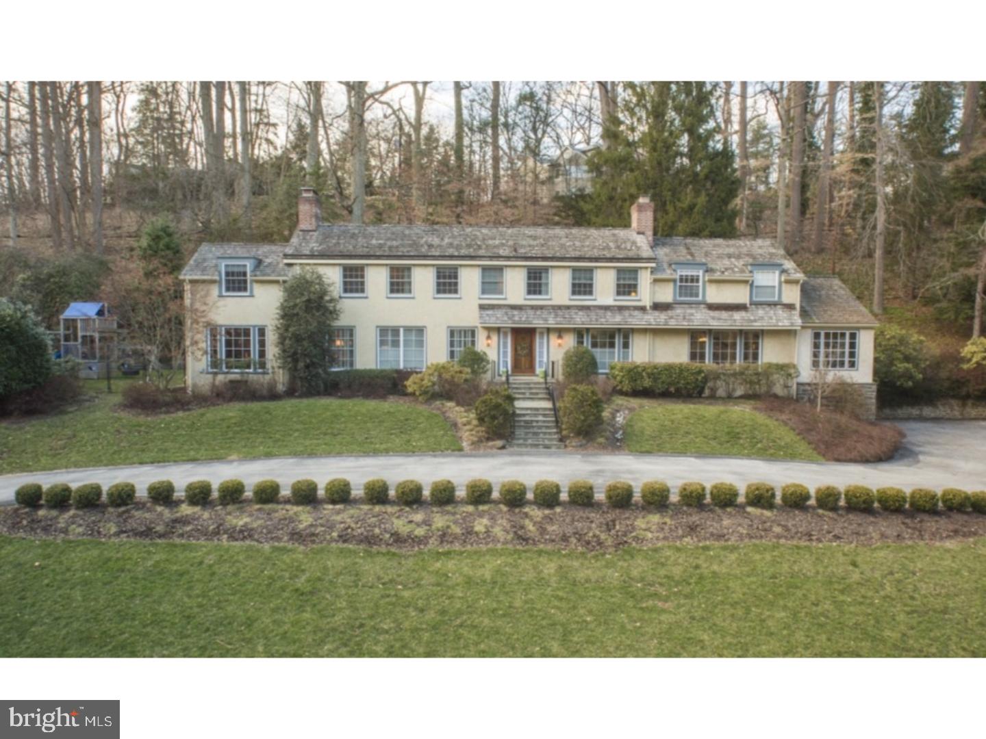 This magnificent 5 bedroom, 5 bathroom Colonial with Mahoney-built 2 story addition is sure to check all the boxes on your list! The solid mahogany door leads you into the foyer with hardwood flooring throughout. To your left is the formal living room with large windows and plantation shutters. The cozy fireplace creates the perfect space for an intimate gathering. Next to the living room is the office, surrounded by windows and flanked by a floor-to-ceiling brick fireplace. To the right of the foyer is the formal dining room, complete with sconces, chair rail & crown moldings and french doors to the patio. The breathtaking addition is the ultimate entertaining area and features a gourmet Eat-in Kitchen with high-end appliances, including Sub Zero refrigerator, Wolf 5 burner range and Bosch dishwasher. The large island with granite countertop is a wonderful space to gather friends and family. Off the kitchen is the family room with gas fireplace and a Juliet balcony. The breakfast room has built-ins with a desk for homework or paying bills. This room boasts a wall of windows, which bathes the room in natural light. Separating these areas is a banquet of cabinets with see through glass doors, a Mahoney signature style. An adorable half bath completes this floor. The second floor features 5 bedrooms and 4 full bathrooms. You will never want to leave the master bedroom suite with it's own fireplace, beautiful master bathroom with double vanity and large shower and walk-in closet. There are three bedrooms that share two updated Jack & Jill bathrooms and one en-suite guest bedroom. Convenient back stairs to the kitchen area. The finished lower level is a great hang out area for the young ones to play with ample space and a double closet. The landscaped grounds are gorgeous and the large slate patio will host magnificent garden parties while the young ones play on the playground. The location of 316 Mill Creek is ideally located (.7 miles) near Suburban Square with expanded Traders Joe's and a myriad of shops and restaurants. Walk to the Ardmore station and take the Amtrak express train right to NYC! Close to the Main Line private schools and the award winning Lower Merion Schools. This location of Haverford affords an easy commute to Center City. This home will not last!