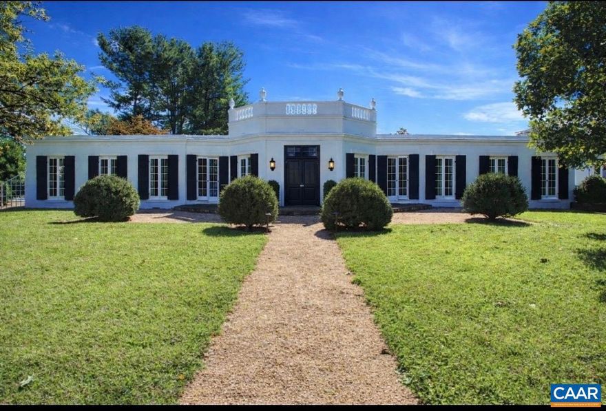 With spectacular pastoral & Southwest mountain views, Little Gap Farm is a dramatic country house just 10 mins from downtown in a tranquil, private setting. Set on 11 acres with beautiful views this formal country property blends classic architecture with timeless comfort. The main residence features gracious one level living with custom mahogany front doors and heart pine floors. A 1999 contemporary addition enhances the original, French Pavilion home with 12-foot ceilings, floor-to-ceiling windows & French doors, timber beams, heated concrete floors and fireplace creating a wonderful heart of the home. Multiple living spaces flow effortlessly for everyday living and entertaining. Enjoy serene outdoor spaces, gardens, and a private swimming pool framed by pastoral landscape. A charming 2-bed, 2-bath cottage offers handsome open living spaces with full kitchen and studio. The property?s setting, framed by distant ridge lines and rolling pastures, evokes the quintessential Virginia country lifestyle yet remains convenient to Charlottesville?s amenities and attractions. Little Gap Farm is a rare opportunity to own an elegant, thoughtfully composed residence with exceptional outdoor and architectural appeal.