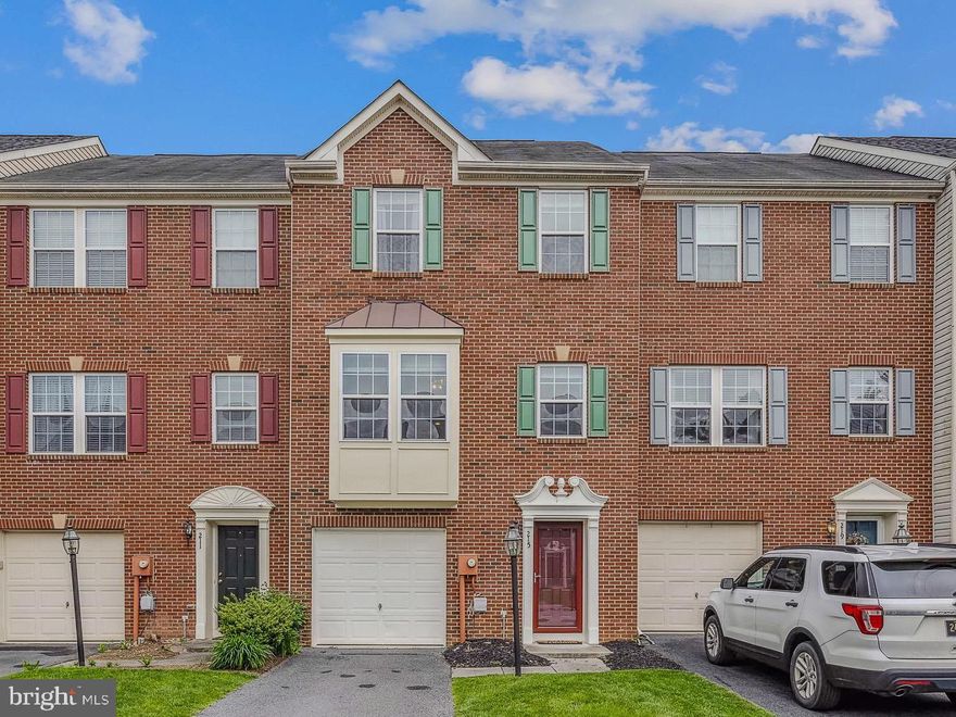 A townhouse with room for everyone that's close to everything-- what more could you want? Just off of route 9, this brick-front townhouse is located in a quiet neighborhood that is close to grocery stores, restaurants, and everything Charles Town and Harper's Ferry have to offer.

This 4-bedroom, 3.5 bath home features two suites as well as bump outs to give you extra space. The lower level has a half-bath and a full-sized laundry room with granite countertops. It also has a bedroom with a walk-in closet and ensuite bathroom.

The bright, open main level contains a large living area along with an eat-in kitchen and a sunroom. The upper level has the primary suite and two additional bedrooms. This home has been well cared for, and is the perfect place for you to make your next home.