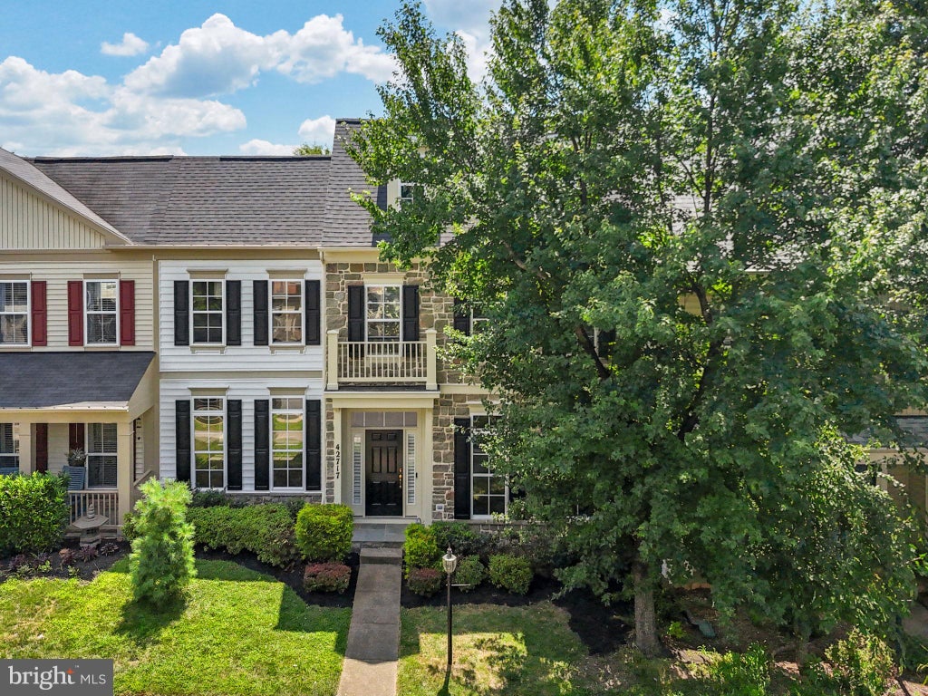 Photo of 42717 Explorer Drive, BRAMBLETON, VA 20148 (MLS # VALO2133202)
