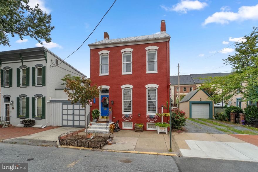Live in the heart of Downtown Frederick in a gorgeous home that's priced to sell! This home appraised for $550k before the basement was updated, so it's a steal at $525,000! This sun-filled, hard-to-find standalone home in the Historic District perfectly blends historic charm with modern updates — just steps from North Market Street’s vibrant shops, restaurants, and bars, and less than a half mile to Baker Park and the scenic Carroll Creek Promenade.
Inside, the renovated kitchen (2019) features granite countertops, stainless steel appliances, and a brand-new Family Hub refrigerator with internet and touchscreen — perfect for meal planning or streaming your favorite music while you cook. Fresh paint, updated flooring, and custom closets throughout make this home move-in ready. The primary suite, redesigned in 2024 with a custom closet system, is a true retreat. The newly finished basement offers versatile living space — perfect for a family room, home office, gym, or guest area — with a modern laundry room featuring new appliances, cabinetry, and butcher block counters, plus a full bathroom (updated 2019). Step outside to enjoy your private brick patio, upper-level balcony, and new decking (2024) — ideal for relaxing or entertaining friends. Additional updates include a new electric panel and a mini-splits were added in 2025 to provide warmth in the winter and cooling in the summer! Parking is convenient with one city parking permit included, plus one rental space available in the back lot (subject to availability and additional cost). No HOA or condo fees! Located near the MARC train, multiple bus routes, and parks, this home delivers the perfect combination of downtown convenience, historic charm, and modern comfort.