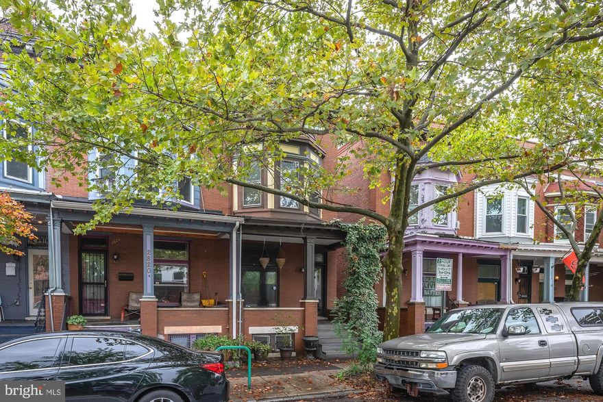 ***Seller is in receipt of one offer with at least two more on the way. Please submit any and all offers by Friday morning 10/4 at 10am

Welcome to this charming Colonial-style rowhome nestled in the heart of Charles Village, Baltimore. This beautifully maintained 3-bedroom, 2.5-bathroom home offers a perfect blend of historic charm and modern amenities. As you approach, you'll be greeted by a spacious front porch, ideal for relaxing and enjoying the neighborhood. Step inside to discover a large living room that seamlessly flows into an upgraded kitchen, featuring a built-in gas range on the island, perfect for entertaining. The main level also boasts a dining area, a convenient half bathroom, and gorgeous hardwood floors that extend throughout the entire home. Upstairs, you'll find three generously sized bedrooms and two full bathrooms, providing plenty of space and comfort. The fully finished basement offers additional living space, ideal for a family room, home office, or gym. Outside, enjoy the fresh air on your private deck overlooking a fully fenced backyard, perfect for gatherings or gardening. Plus, the detached garage offers secure parking and extra storage. Don’t miss the opportunity to make this delightful Charles Village rowhome your own!