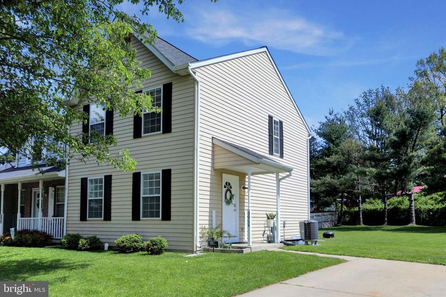 Move in ready!!  3 bedroom 2.5 bath duplex with level rear yard.  Steps away from Hampstead Panther Park.  New HVAC  and Hot water heater 2019, new roof 2015  and new wood look vinyl flooring throughout the main level.   Partially finished basement does have walkup  exit to rear yard .  Make your appt today!