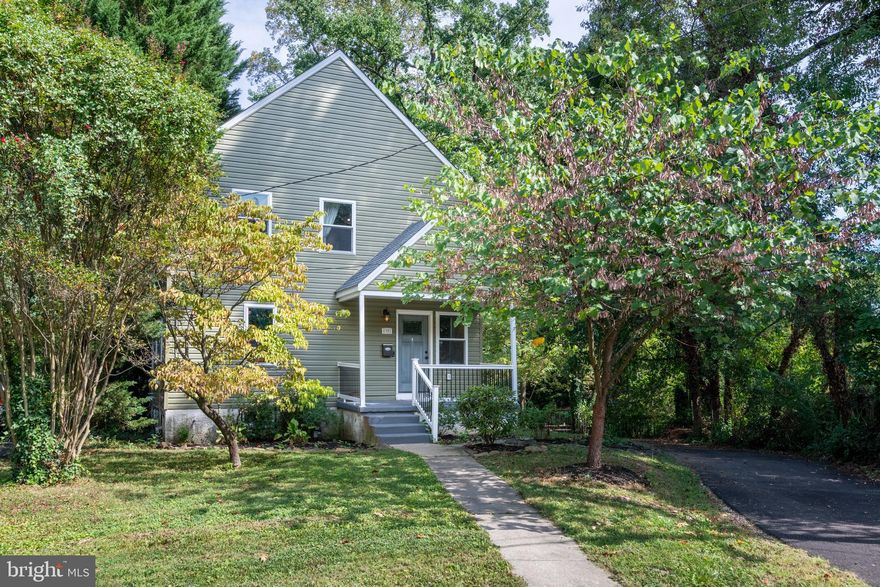 This home, which was originally a Cape Cod-style cottage, has been FULLY REBUILT to include a change in home-style (from Cape to Modern Colonial) and a significant increase to livable square footage (not reflected in tax record). Stepping through the front door, you are welcomed by a seamless blend of modern design and classic Baltimore charm. The first floor features an open flow living/dining area alongside a stunning kitchen. Truly the heart of the home! The second floor was remastered with full ceiling height in every room, and now includes 3 bedrooms, a full bath off the primary, expanded closet space, and a 2nd full bath in the hallway. New windows, new doors, new appliances, new floors, new HVAC and all new systems are tucked inside a carefully curated rebuild with expanded square footage (from 1,356 to approximately 1,650+) with new siding & roof surrounded by a tree lined .43-acre yard! The newly paved and widened driveway is ready for you and your guests, offering ample off-street parking. This 4 BR / 3.5 bath home also provides a main level bedroom, a main level full bath, and an upper-level laundry area, with front loading W/D. Basement is mostly original and unfinished but offers plenty of usable space, with both front and back areas and an exterior door w stairs to backyard. The multi-level deck off kitchen looks over a large, flat, green yard space with trees, a chicken coop, and a shed. This former cape cod turned modern two-story home seamlessly blends classic features with contemporary amenities, creating a comfortable and elegant space for today's living. A perfect blend of comfort and style!