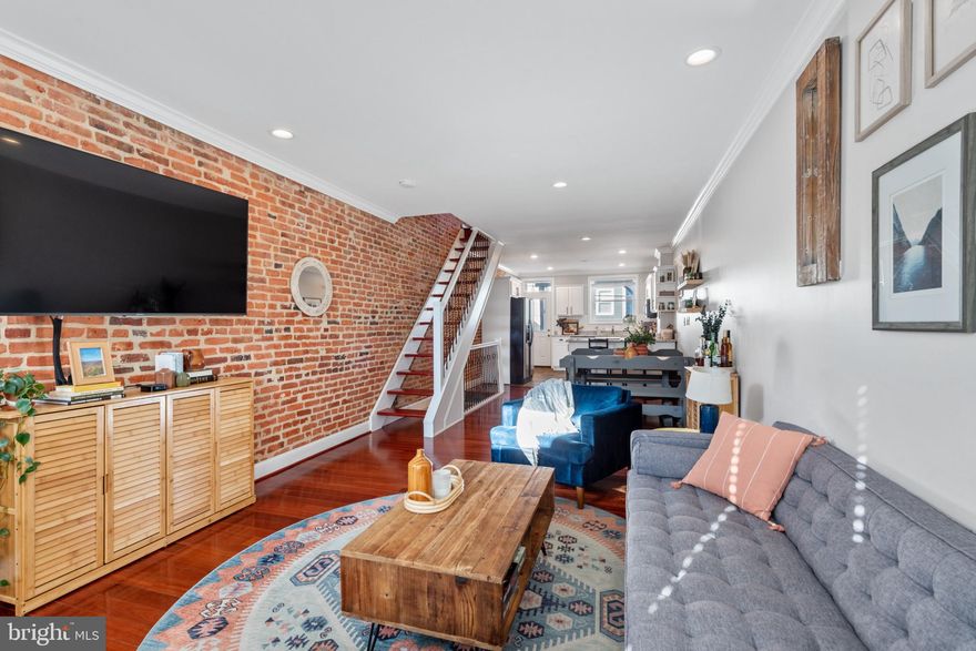 OFFER DEADLINE 3/29 @ 3PM ----WELCOMING LARGE & UPDATED PATTERSON PARK HOME W/ 3 FINISHED LEVELS, OFF STREET PARKING & TWO TIER ROOF TOP DECK WITH INCREDIBLE VIEWS - this stylish home located just a few blocks off of Patterson Park features an open floor plan with hardwood floors, exposed brick, crown molding, large living room, spacious dining area and renovated eat-in kitchen with shaker cabinets & granite countertops, ss appliances and convenient breakfast bar leading to your parking pad.  The upper-level traditional floorplan offers a front of the home owner's suite and rear bedroom w/ hallway bathroom connecting to a two-tier roof top deck with sweeping views of Patterson Park.  Not to be missed is the oversized walkout basement with two large rooms, laundry and a full bathroom.  Recent updates within the last several years include: ---> fully dug out to 8' ceiling height and finished walkout basement, owner suite bathroom renovation, new granite countertops, new hvac system, new windows & doors, two tier roof top deck added, new carpet and so much more.  Come take a look!!