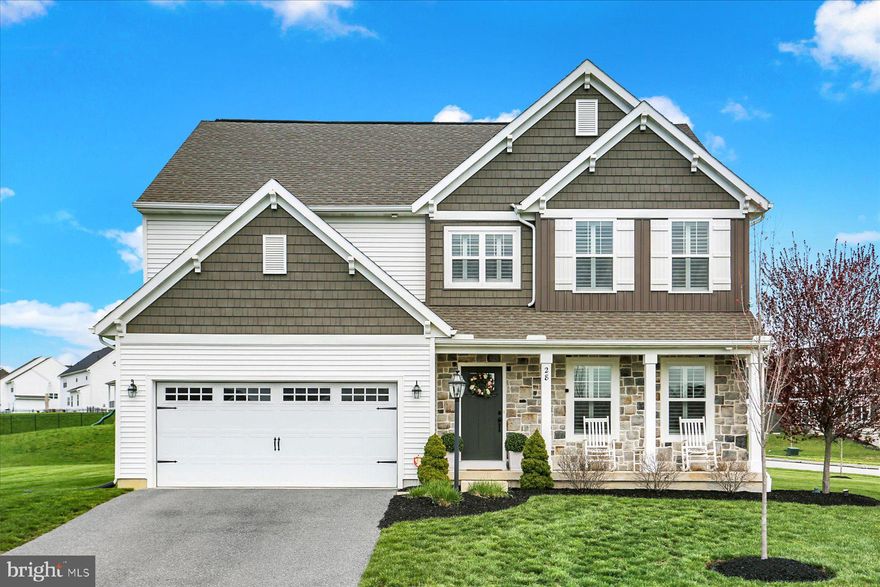 You do not want to miss your chance to see this immaculately kept 2,592 square foot, 4 bed, 2 1/2 bath home sitting on just over half an acre.  Situated on a corner lot, there is plenty of outdoor space to enjoy and entertain!  This home is warm and welcoming with a charming aesthetic you will immediately feel comfortable in.  As you step inside, you'll notice the rich hardwood floors that add warmth throughout the main living area.  The office, to the right of the foyer, is the perfect place for a playroom or home office with french doors to keep the sound in or out!  Continue down the hall and you'll reach the coat closet and nicely sized powder room.  Once you make your way to the main living area, you'll be greeted with a ton of natural light!  The large family room has a gas fireplace wrapped in stone with shiplap above.  An accent wall in the kitchen and dining area has the same stone to offer a beautiful contrast to the white shaker cabinets and adds character and warmth to the space!  The kitchen features stainless steel appliances, granite counters, white subway tile backsplash, and an apron farm sink.  Through the kitchen you'll find the entrance to the garage and a spacious mudroom. The shiplap wall and bench make for an inviting drop zone.  From there you’ll find the beautiful pantry.  Starting with the custom wooden doors every detail of this pantry will leave you in awe!  The white shaker cabinets, granite counters, white subway tile backsplash, and stainless-steel beverage fridge all tie into the kitchen to keep the space cohesive. Upstairs you'll find all four bedrooms, a hall bath, and generously sized second floor laundry.  The primary bedroom is situated just off the stairs, tucked around the corner, with a private yet grand french door entrance.  The tray ceiling detail and double walk-in closets add to its grand feel.  The large primary bath features a double sink vanity and tile shower.  The additional bedrooms are all spacious with bedrooms 2 and 3 each featuring their own walk-in closets.  All appliances, window treatments, and the 77in TV come with the sale! This charming home only needs you to bring your things!  Schedule your showing today!