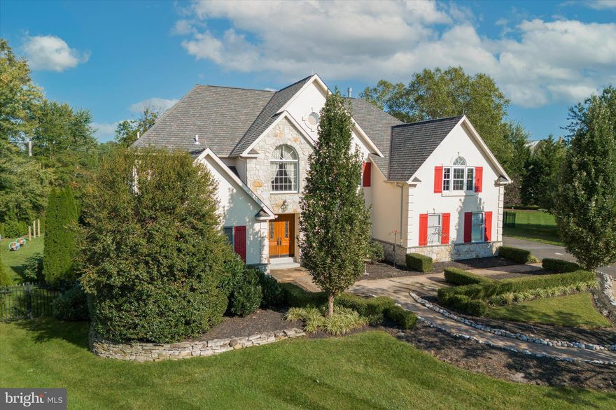 Welcome to this spectacular home situated on a cul-de-sac in the exclusive and desirable Normandy Farm Estates. This custom-built colonial has an array of features that surpass most homes. The rich wood double front door invites you into the two-story open foyer covered in marble flooring. French doors lead right into a large living room with a cathedral ceiling and gleaming hardwood floors. Adjacent to the living room is the sophisticated study showcasing custom hardwood flooring, wood paneling, custom built-ins, and a coffered ceiling adding to the richness of the room. The gourmet main kitchen is beyond words with its custom tiled backsplash, 6 broiler Thermador, stainless steel double ovens, Miele dishwasher, and extra-large custom-sized Sub-Zero fridge and freezer. The sizable island with granite countertops contains cabinet space and a sink. French doors connect the main kitchen into a bright sunny breakfast room surrounded by windows and a sliding glass door that leads outside to the large deck. Off the main kitchen is the butler’s kitchen, which includes both butcher block and granite countertops, additional cabinet space, a four-range stove with a flat top griddle and oven, an in-cabinet commercial fridge, and a large sink. From the butler’s kitchen, there is access to the attached one-car garage with built-in storage cabinets and a closet. Also attached to the main kitchen is the butler’s pantry containing a wine fridge, cabinets, and custom-tiled backsplash leading right into the expansive dining room with custom molding, hardwood floors, and a granite table that seats 10. Overlooking the main kitchen is the great room with plenty of light thanks to its elevated ceiling and wall of windows. It also contains a large stone fireplace. Rounding out the first floor are two half bathrooms. 

The second floor has a glamorous master bedroom with large windows and a cathedral ceiling that flows right into a sitting room. The master bathroom contains a vaulted ceiling, two vanities, a large shower stall with a custom tile design, a stand-alone tub, a custom walk-in closet, and two skylights to bring in plenty of natural light. There are three additional bedrooms on the second floor. Two of the three bedrooms share a hallway bathroom, while the third bedroom has a spacious bathroom and walk-in closet. The Third floor has a bedroom with a bathroom and a walk-in closet. The finished basement offers another full bathroom, substantial entertaining space, a custom built-in bar, ample space for storage, as well as two additional bedrooms. The backyard is a sanctuary offering an incredible in-ground pool, hot tub with bluestone decking, and ample yard space with a children’s playset. 

This stunning home is located in the top-ranked Wissahickon school district with proximity to shops, restaurants, major highways, and more.