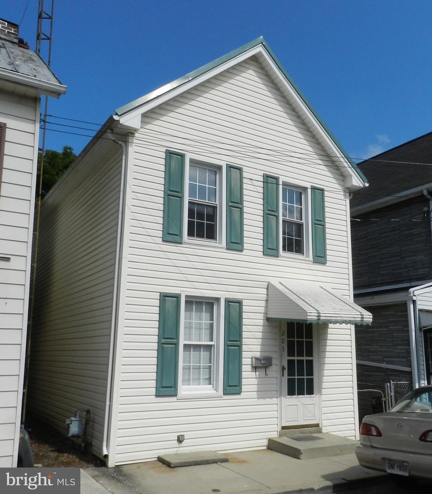 2-3 bedroom home convenient to I-81 for easy commuting.  Features: new carpet, freshly painted, possible 3rd bedroom is a walk-through, newer metal roof, separate dining room, basement for storage, fenced back yard, and 1 year home warranty.