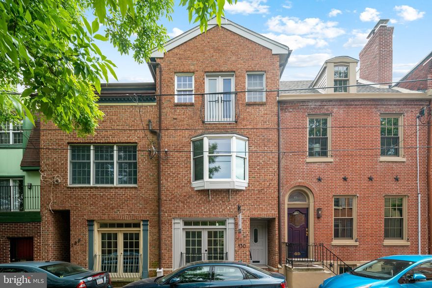 Welcome to 130 Carpenter St with assigned parking! A rare 20-foot wide 4 bed 3.5 bath historic home located in the highly sought after Queen Village neighborhood. This one of a kind home has been fully rehabbed and features top of the line finishes throughout for luxurious living, and TWO outdoor spaces including a balcony and rear backyard! This spectacular kitchen with floor to ceiling Porcelanosa cabinets includes a Wolf cooktop, Panel ready Italian appliances and double thick quartzite countertops. Walk upstairs and to two beds/baths that feature floor to ceiling tile, high ceilings, custom closets and 7 foot long wide plan white oak floors. Historic homes are built much better as one of the party walls is constructed with concrete block. Prime Queen Village location with walking distance to incredible restaurants such as Hungry Pigeon, Royal Sushi & Izakaya, Cry Baby Pasta, with easy access to 95!