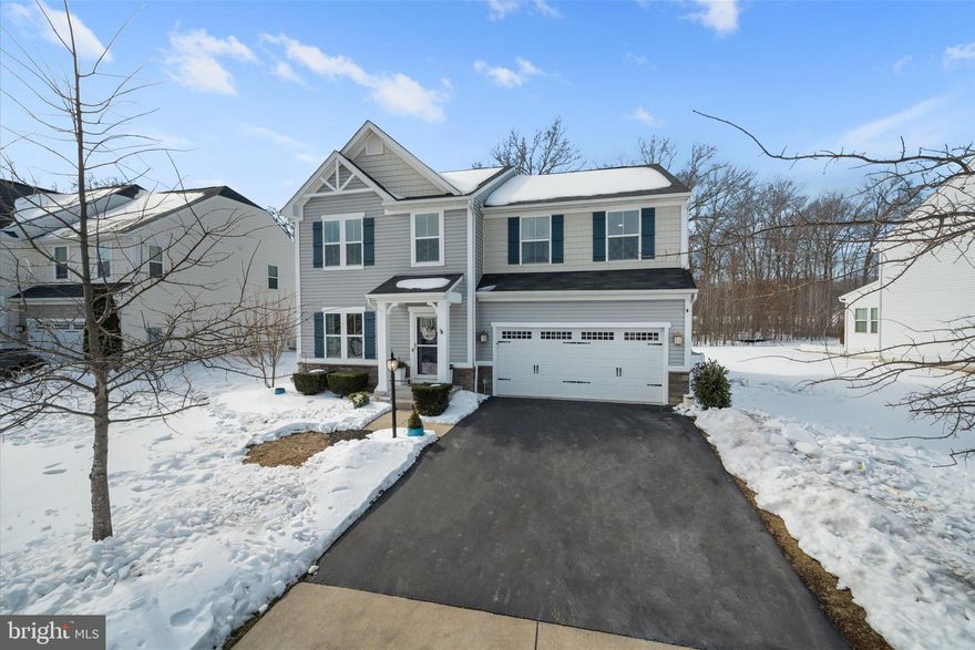 Welcome to 6841 Lake Anne Ct in beautiful sought-after Brookside community!  This 4 bedroom, 3.5 bathroom home has over 4240 sq ft of finished space across three levels. Backing to wetlands this home is nestled on a cul-de-sac court with a .24 acre private, flat lot delivering the ideal blend of privacy, functionality and tons of updates!  Step inside to be greeted by hardwood flooring throughout most of the main level. The layout is elegant and practical featuring  a private office, formal dining space, powder room and a spacious open concept gourmet kitchen, morning room and family room with gas fireplace combo.  Recent appliance3 updates include cooktop, fridge and dishwasher.  Off the inviting and light filled morning room , french doors lead to a large trex deck and patio perfect for outdoor entertaining.  Upstairs the upgraded laminate flooring continues through all of the bedrooms. A large flexible loft space welcomes you at the top of the stairs perfect for study space, extra living space or playroom.  The large primary suite is a owners retreat, it has custom- organized walk in closets with a spacious bath featuring a large shower, double sinks and linen storage.  Three additional roomy bedrooms share a hall bath and a conveniently located upper level laundry space rounds out the upstairs level.  The fully finished lower level expands the living room option with a massive recreation room, custom wet bar, full bath and impressive storage area. Walk up access leads directly to the backyard. Recent updates include: all first floor engineered hardwood flooring refinished (2026), living room carpet, new kitchen cooktop, (2025), 2nd floor laminate flooring (2024), fireplace burner, kitchen fridge, dishwasher, whole house water softner, garage door , walk in closets organizing systems (2023), storm door (2020).  Kettle Run HS Pyramid. The Brookside community has multiple lakes, two pools, tennis and basketball courts, a fitness center, playgrounds, and more than seven miles of scenic walking and biking trails.  Conveniently located close to major commuter routes, wineries,  breweries, restaurants and shopping. Don't miss an opportunity to call 6841 Lake Anne Ct with it's private setting, extensive updates and prime Brookside location your new home.