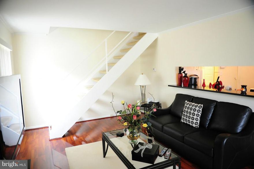 WELCOME HOME! THIS CHIC 2 BR/1 BA CONDO/TOWN HOME BOASTS AN OPEN FLOOR PLAN & IS LOADED W/UPGRADES, INCL GRANITE COUNTER TOPS & CERAMIC TILE FLOORS IN THE KITCHEN; HARDWOOD FLOORS ON THE MAIN LEVEL; RENOVATED BATHROOM & WW CARPET ON THE UPPER LEVEL. CONVENIENTLY LOCATED NEAR I-95; MINUTES TO JOINT BASE ANDREWS, NATIONAL HARBOR, AND THE NEW DAVE & BUSTER'S/RITCHIE STATION MARKETPLACE!