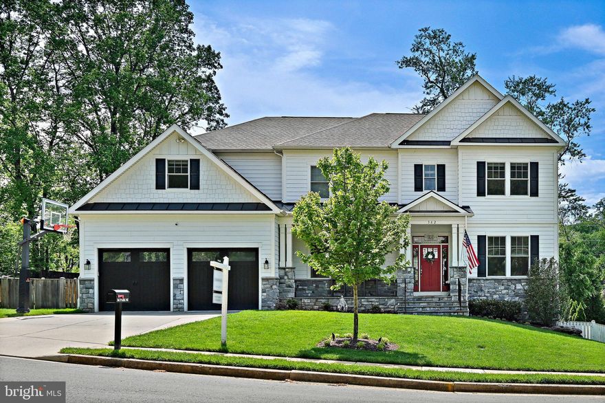 **OPEN SUN 4/26 12-3PM** Prime Location & Modern Luxury in the Heart of Vienna: Experience the ultimate Vienna lifestyle in this stunning 2015 custom build by Reel Homes. Situated just one block from historic Church Street, this residence offers rare, effortless walkability to local favorites like the Vienna Town Green, the W&OD Trail, and seasonal town festivals. Families will benefit from a location within one of the area's most desirable school pyramids: Vienna ES / Thoreau MS / Madison HS, ensuring a world-class education just minutes from home.

Chef’s Kitchen & Elegant Finishes: Designed for both sophisticated entertaining and daily comfort, the main level features seamless hardwood floors that flow into a true gourmet kitchen. Outfitted with professional-grade Sub-Zero and Wolf appliances, this space is the heart of the home, perfect for everything from quick morning coffees to hosting elaborate dinner parties. The interior details are sleek and sophisticated, setting a tone of modern luxury that carries through the expansive upper-level bedroom suites and the durable, stylish LVP flooring of the lower level.

The Ultimate Oversized Garage with EV-Ready Tech: A rare find in the Town of Vienna, this home features an oversized two-car garage with individual doors, specifically engineered with extra height, width, and length. The space comfortably accommodates two full-size pickup trucks with enough clearance to fully open doors and exit the vehicles with ease. For the eco-conscious driver, a ChargePoint high-speed EV charger has been professionally installed and hardwired directly to the electrical panel, while the massive excavated storage area beneath the garage provides incredible space for tools, seasonal gear, or a workshop.

Entertainment-Ready Lower Level: The fully finished basement serves as a private sanctuary for recreation and wellness. Movie nights are elevated in the professional-grade home theater, featuring tiered stadium seating and movie-theater-quality picture and sound, while the adjacent full wet bar makes the space an entertainer’s dream. Fitness enthusiasts will appreciate the dedicated home gym, a custom-built SORINEX power rack designed to support rigorous training goals without ever leaving the house. Every secondary bedroom in the home has a primary-suite feel, with its own en suite bath and spacious walk-in closet for ultimate privacy.

High-Performance Infrastructure & Grounds: While many homes offer style, this property provides unmatched peace of mind through superior technical infrastructure. A commercial-grade Kohler 48RCL whole-home generator ensures you are never without power, and a multi-zone ductless HVAC system provides precision climate control in every room. An eight-zone, 22-speaker home audio system ensures you are surrounded by your favorite tunes at all times. The exterior is equally impressive, featuring extensive professional landscaping, an automated, 11-zone irrigation system, and sophisticated landscape lighting that creates a breathtaking evening ambiance across the pristine grounds.

This is a must-see home that represents a rare opportunity to own a high-spec modern build in the town’s most walkable and sought-after enclave.