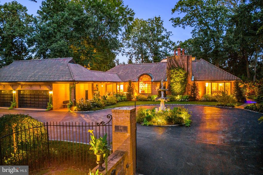 Welcome to this incredible, custom designed, European-styled masterpiece! This fabulous one-of-a kind property with luxurious first floor primary suite offering two custom tiled marble baths and multiple walk-in closets has it all. It is set on a breathtaking 1.4 acre gated lot within the famed Merion Golf neighborhood, close to renowned schools and Universities, all forms of transportation, abundant restaurants. endless shopping venues, Whole Foods, Farmer's Markets, walking and biking trails and more. Features include a sun-filled open floor plan, perfect for effortless living and easy entertaining, built around and integrated with an expansive, glassed-in heated indoor/ outdoor pool with full bath and beautiful terracing, French doors and operable glass ceiling, allowing an easy outdoor flow to the stunning grounds. Enjoy the graciously proportioned rooms, high ceilings, Venetian plaster walls, custom materials and refined finishes throughout, 5 gas fireplaces, first floor guest suite, 2-3  additional second floor bedroom suites with full baths and expansive lower level with powder room, media room and lots of storage. Every interior and exterior aspect of this residence has been meticulously executed, seamlessly blending the indoor and outdoor living spaces for unparalleled year-round enjoyment.