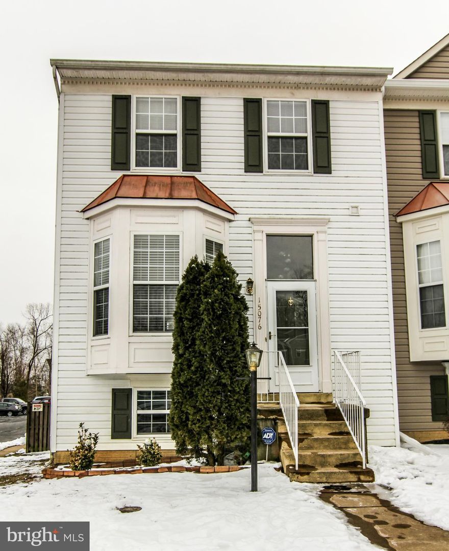 Upgrades Throughout!!! Sunk-in family room w/ bay window & tons of light. Dining area w/ hardwood floors & pass through to kitchen. Gourmet kitchen w/ center island, granite counters, updated appliances, & space for table. Walk out to Huge deck overlooking large flat fenced back yard. 3 bedrooms upstairs w/ luxury master suite that offers vaulted ceiling & WIC. Huge basement w/ 4th BR & full bath.